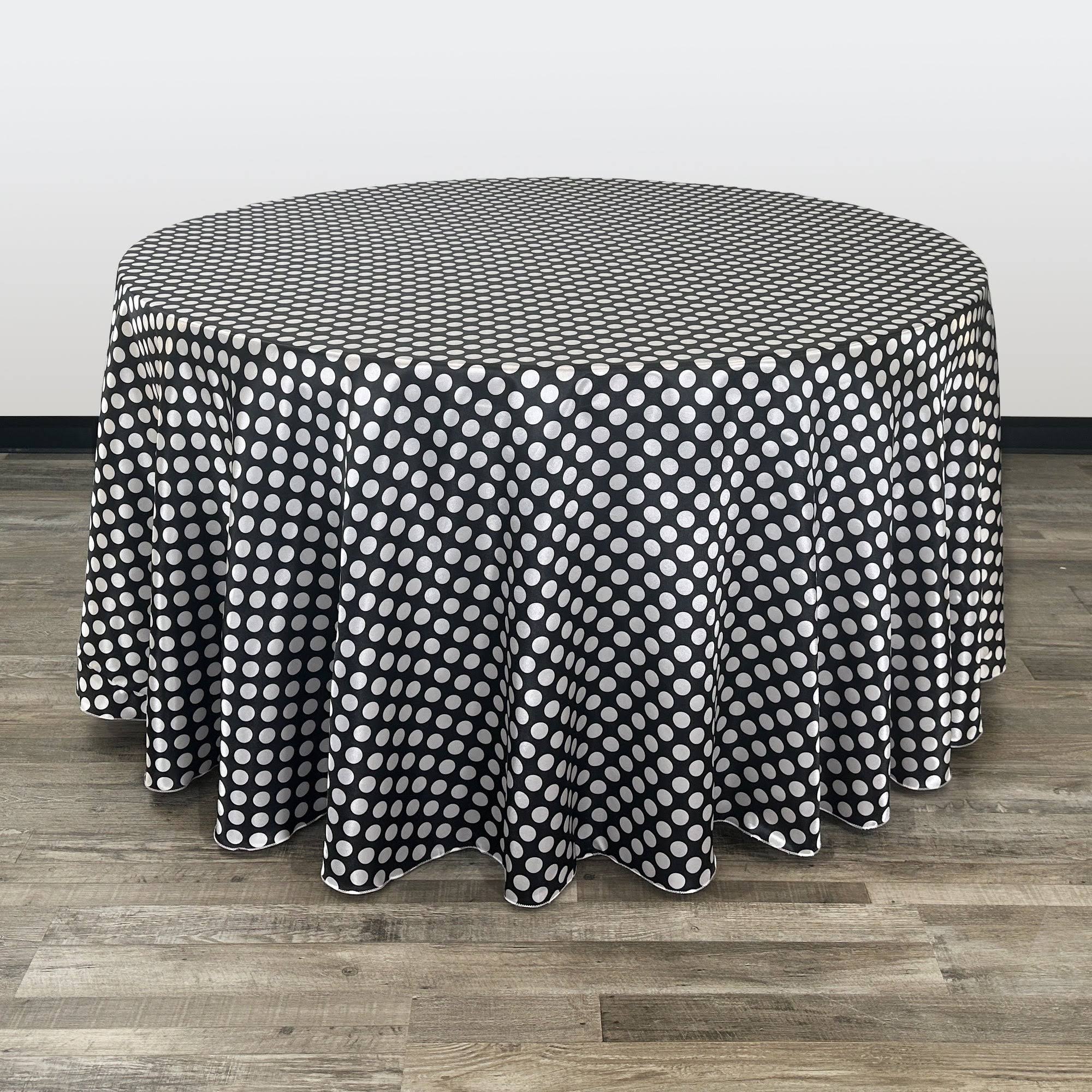 54a08fd0c9257bf69deabad11496132702ae023637a066c93f43a8d5d1e809c4.jpg Your Chair Covers - 120 inch Round Satin Tablecloth Black/White Polka Dots - Image 1