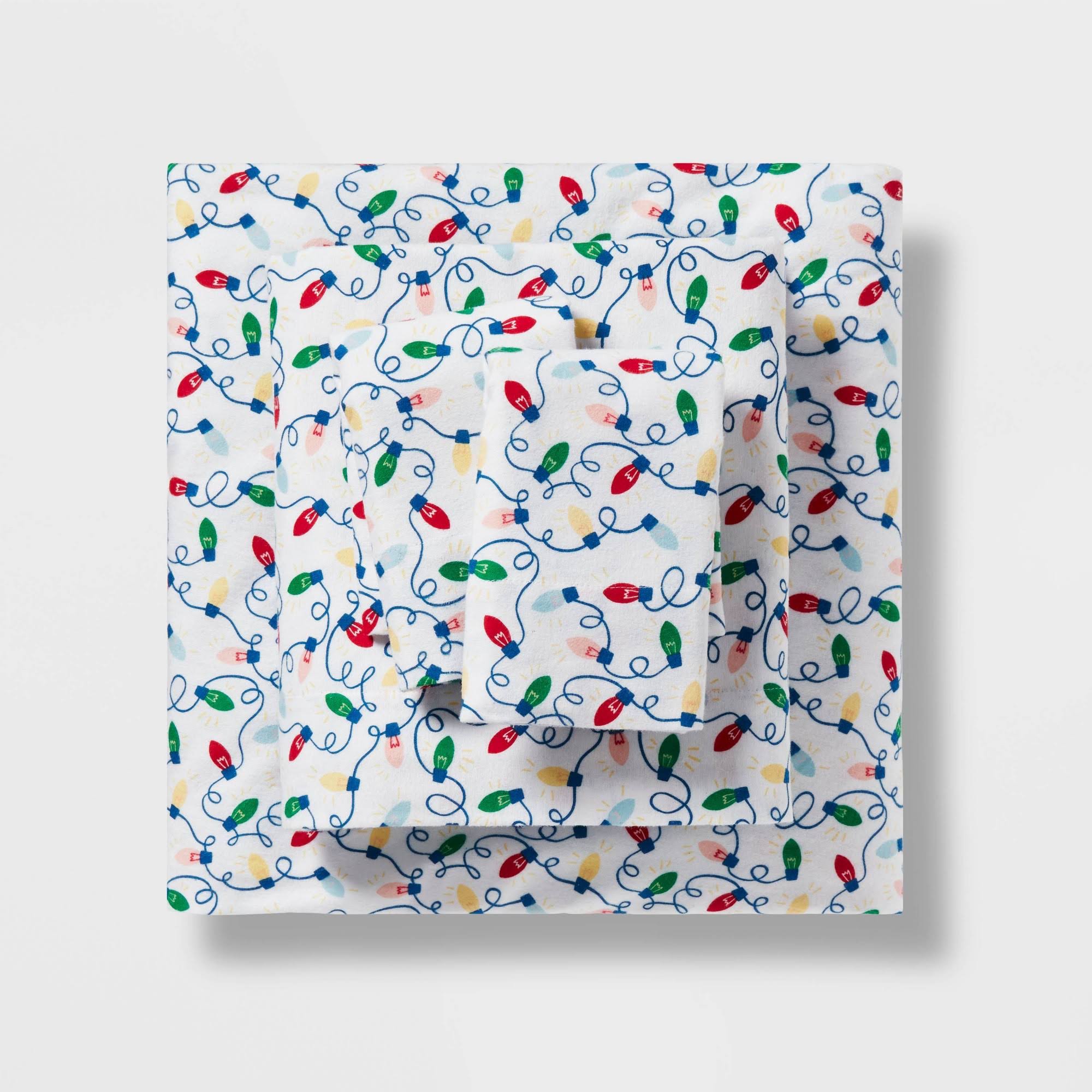 55f1c5d0acbb26509611eb11a0ca36c81529aa9c3f2d90f420a59d5ce9e514f9.jpg King Christmas Flannel Sheet Set Bulb Print - Wondershop - Image 1