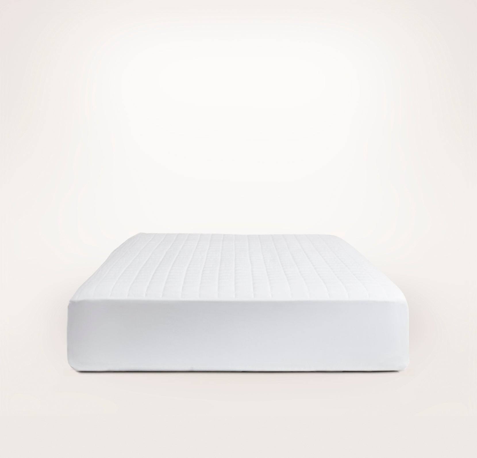 5634e2e3b4ffb6e5625a973ef4375127ea2517b57da81f337edb26bcb2919dba.jpg Boll & Branch Organic Cotton Quilted Mattress Pad in White - Image 1