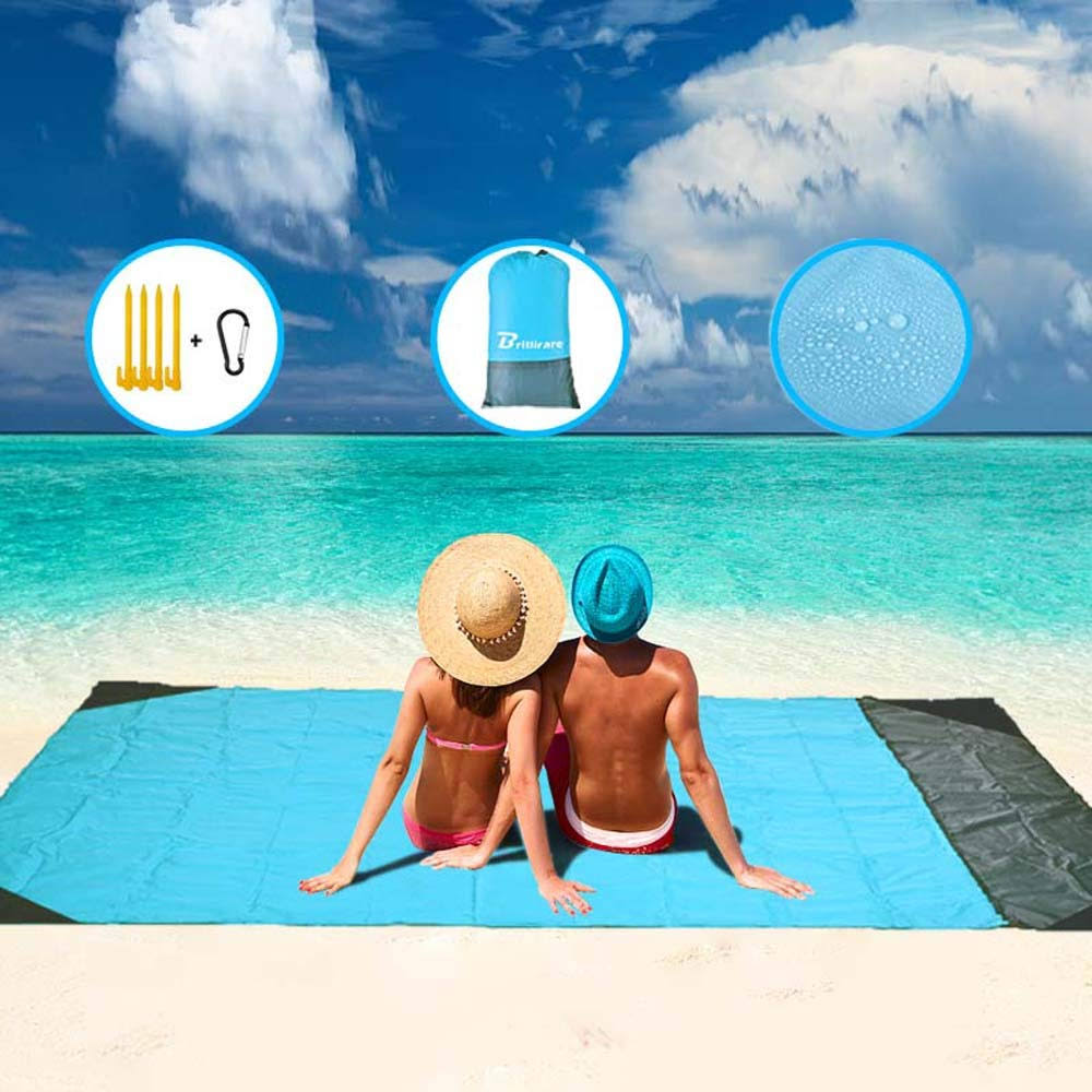 59657d46eaf859ab57e71082d4c2f2b6acd1942792b278e703503bc6391cea40.jpg Brillirare Sandfree Beach Blanket, Oversized Waterproof Sandproof Picnic Blanket, Quick Drying Lightweight Family Mat with 4 Stakes&4 Corner Pockets - Image 1
