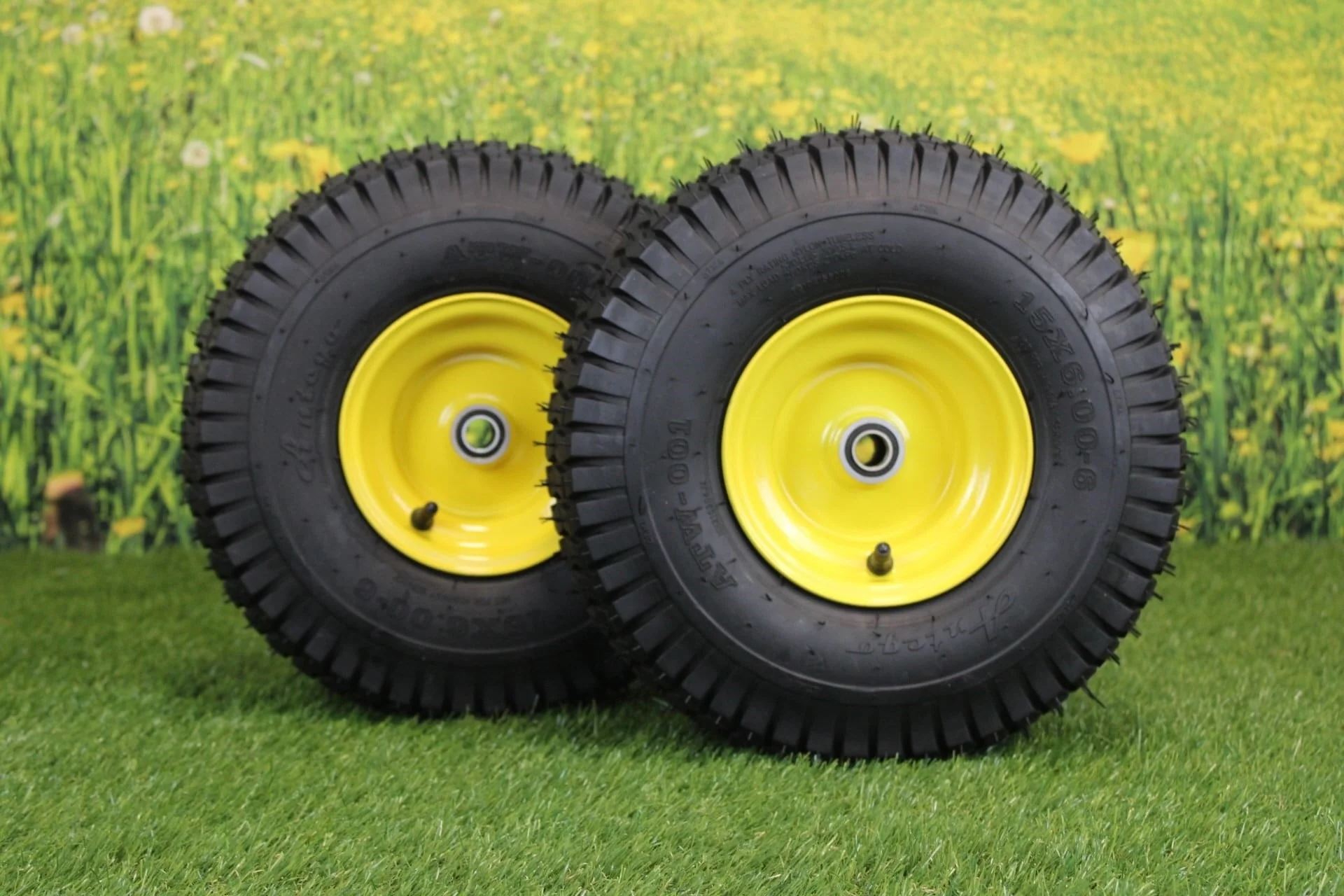 59ae5862c4b1418727461beda3c9fe6818a6449730156131680000d894b2cacc.webp Antego Tire and Wheel 15x6.00 - 6 Tires & Wheels 4 Ply for Lawn & Garden Mower Turf Tires .75" Bearing (SET OF 2) - Image 1