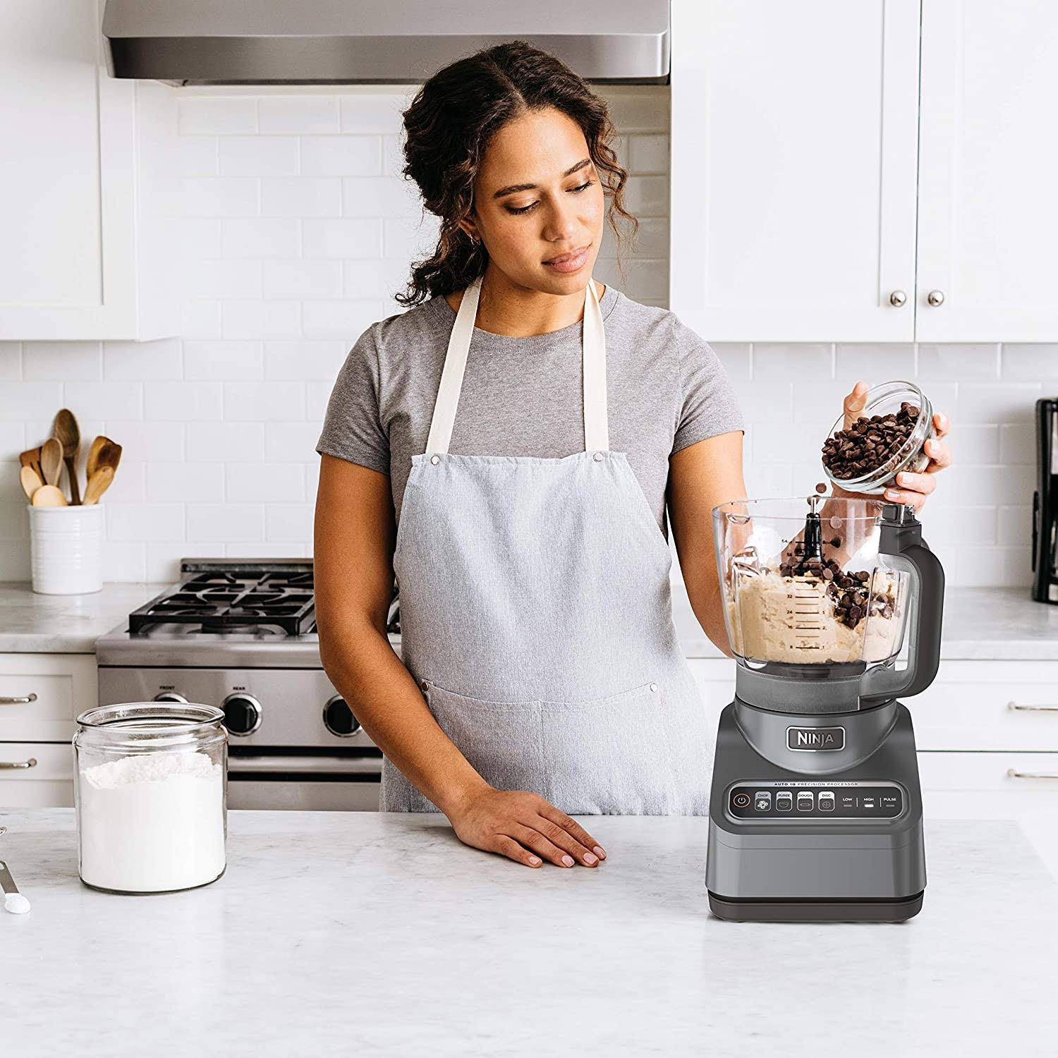 5b5131b4b095b8f53b749904aabac51022d3677eb47131b37bea081b3c25a7d6.jpg Ninja Bn601 Professional Plus Food Processor 1000-Peak-Watts with Auto-iQ Preset Programs Chop Puree Dough Slice Shred with A 9-Cup Capacity and A - Image 1