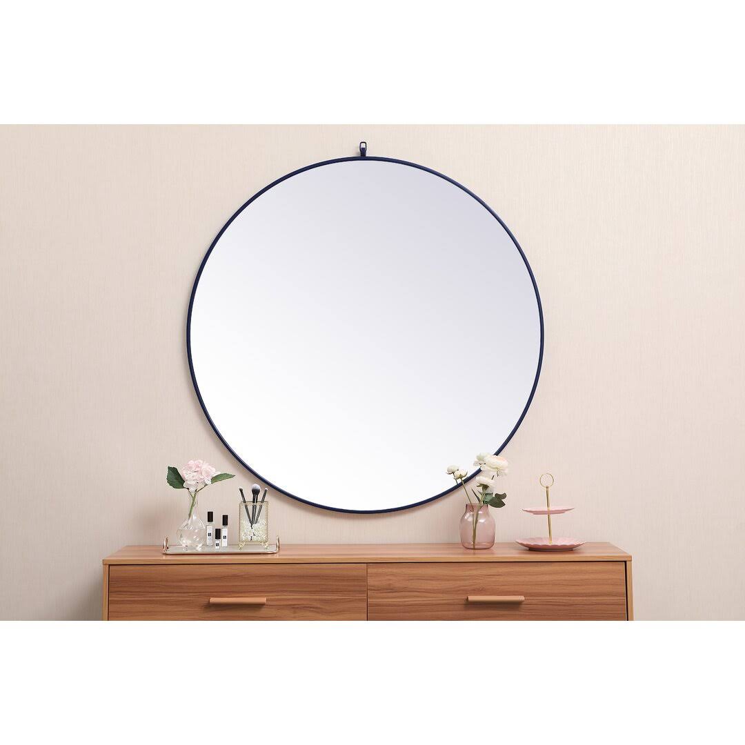 5c4ac37fa35413d5bc499187e846bdec2a430ae13816a6e7c4681da3302f9ad5.jpg Cassie Round Wall Mirror Finish: Blue, Size: 45" x 45" - Image 1