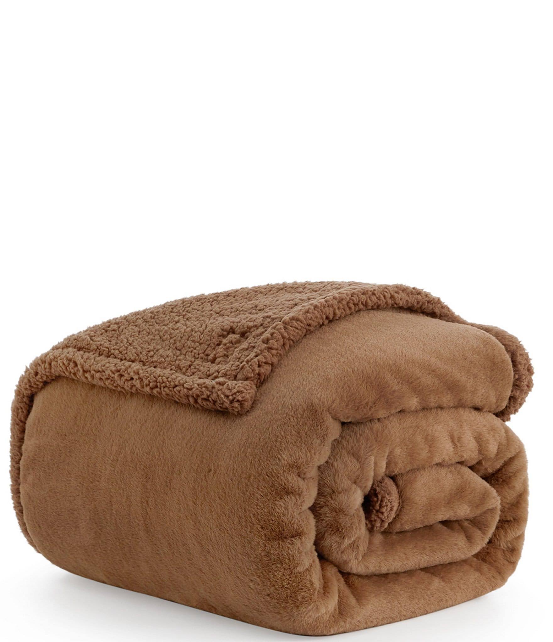 5c6899405aeaf2547c2b3b4822c9c2a3b951c9c91008de0bf8c8986a5b83ea4a.jpg Ugg Cynthia Faux Fur Throw Blanket - Chai Spice - Image 1