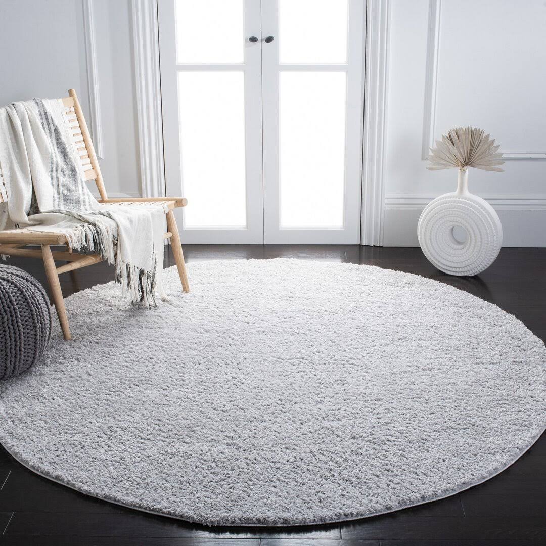 5cdf621317bd5ac2be9dafea070125c82c5ea8331d5a16d23832a3d1faa03c59.jpg Aidoo Light Gray Area Rug Ebern Designs Rug Size: Round 6'7" - Image 1