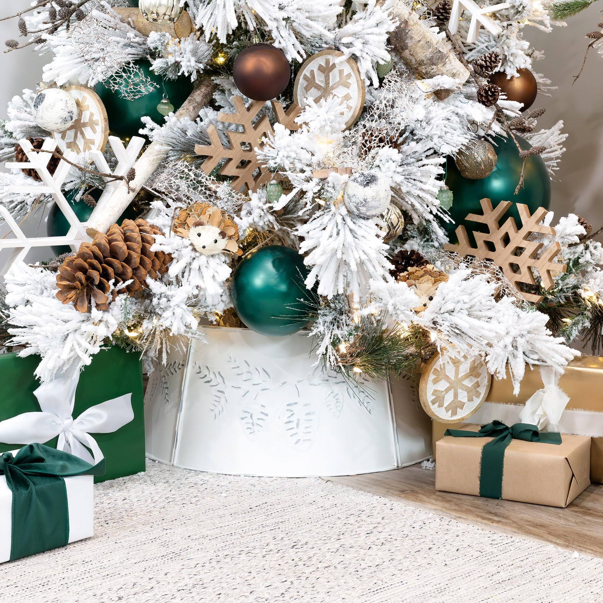 604797ea2b25930fa8e7b2e5386ab851c6e70dab9f85d67dbf6897789b7db007.jpg AuldHome Rustic White Tree Collar (Pine Embossed, Large), 29-inch Diameter Base Vintage Enamelware Christmas Tree Accent, Distressed Pine Cone Design - Image 1