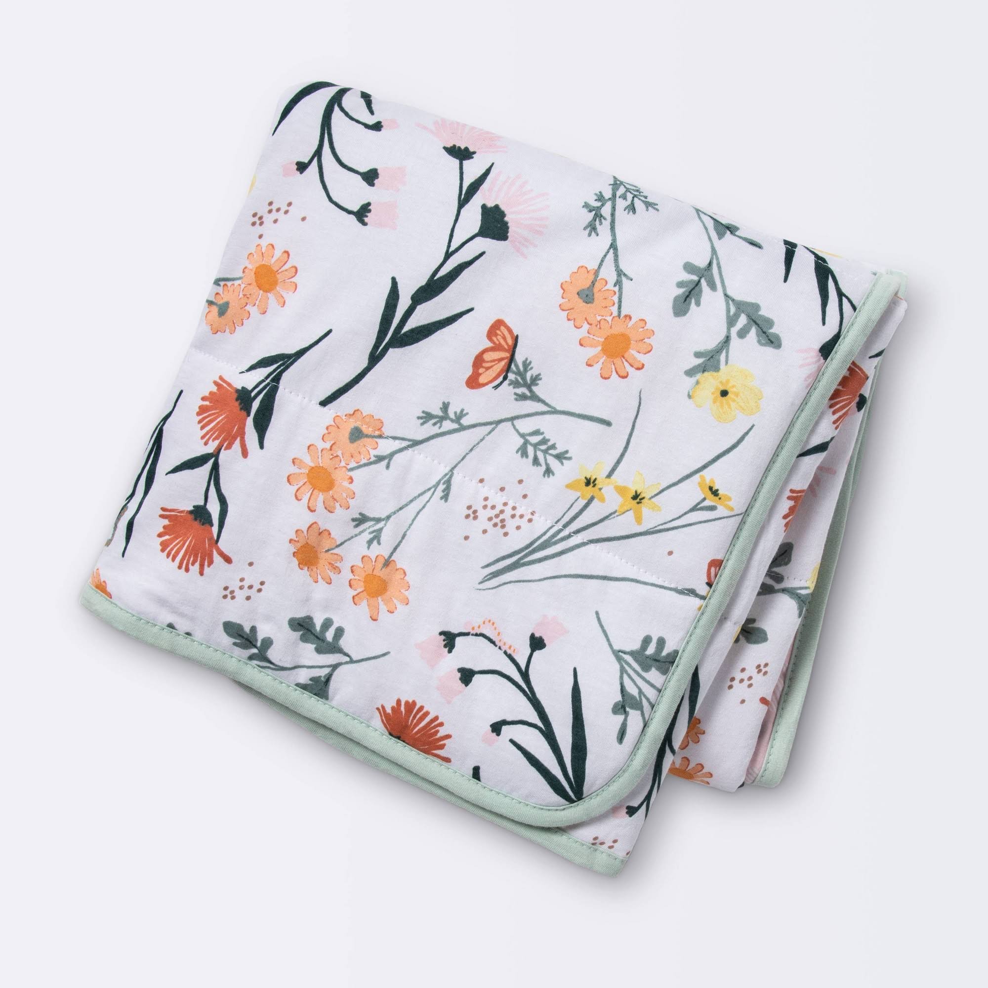65672c23afd04d77ef3a59bd6aaff66ce7b702ae38cd62773a23a53a1352b87d.jpg Cloud Island Jersey Knit Reversible Blanket Garden Floral | Target - Image 1