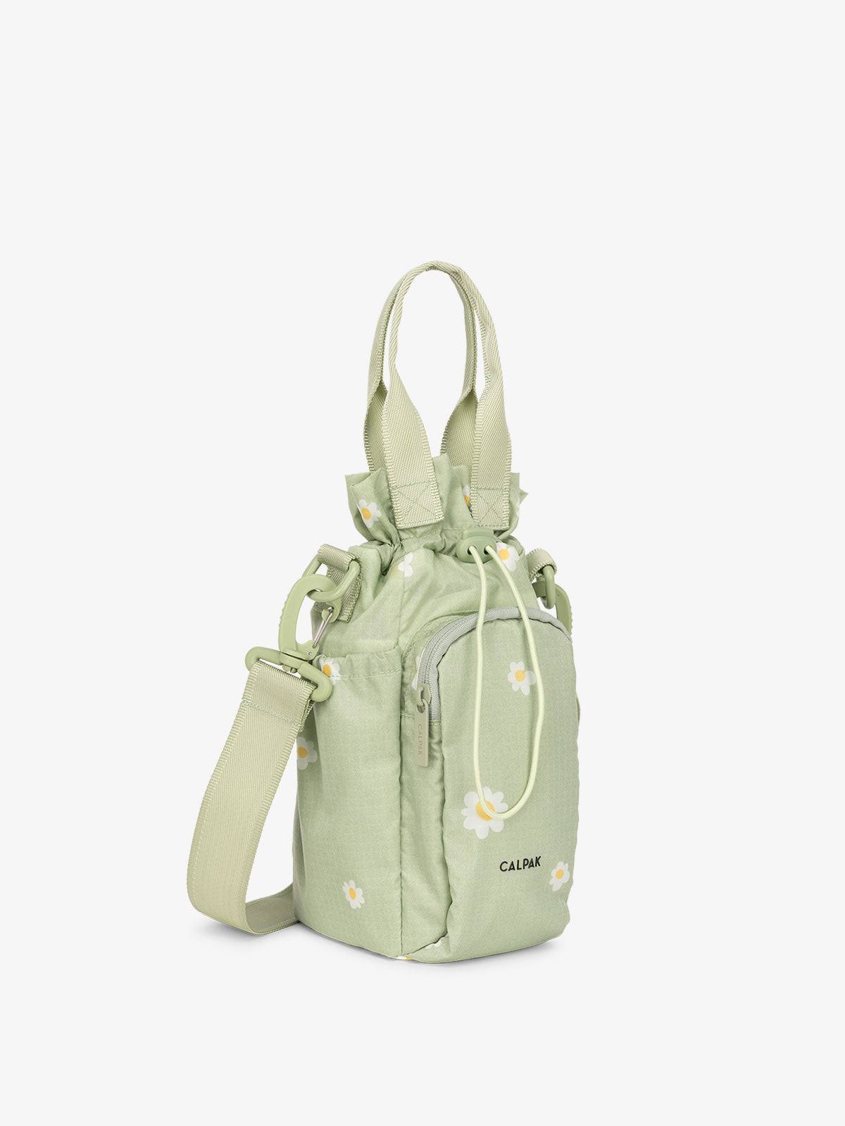 69a0975646a9fe32269c8cbab7360a85276a9d48c96fa28f0d1e589042835bc0.jpg CALPAK Water Bottle Holder in Daisy - Image 1