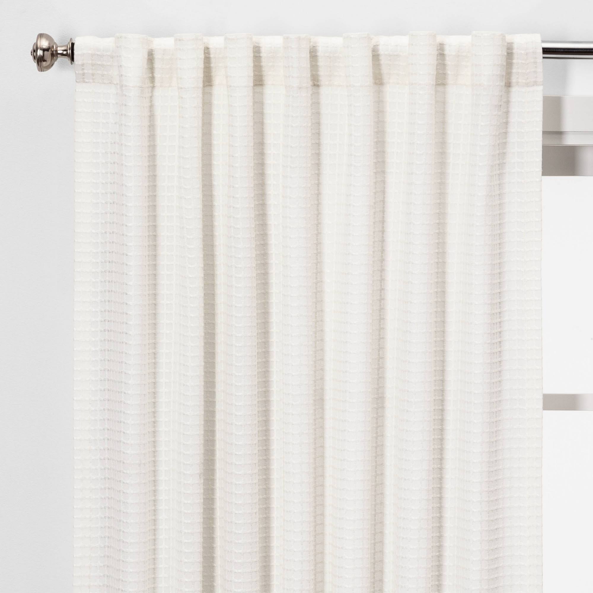 6cd56db4da5bc95f8443c90a0952c28c9d4accb249072e4083cb8d75ff341898.jpg Threshold Light Filtering Honeycomb Window Curtain Panel - White - 54 x 84 in - Image 1