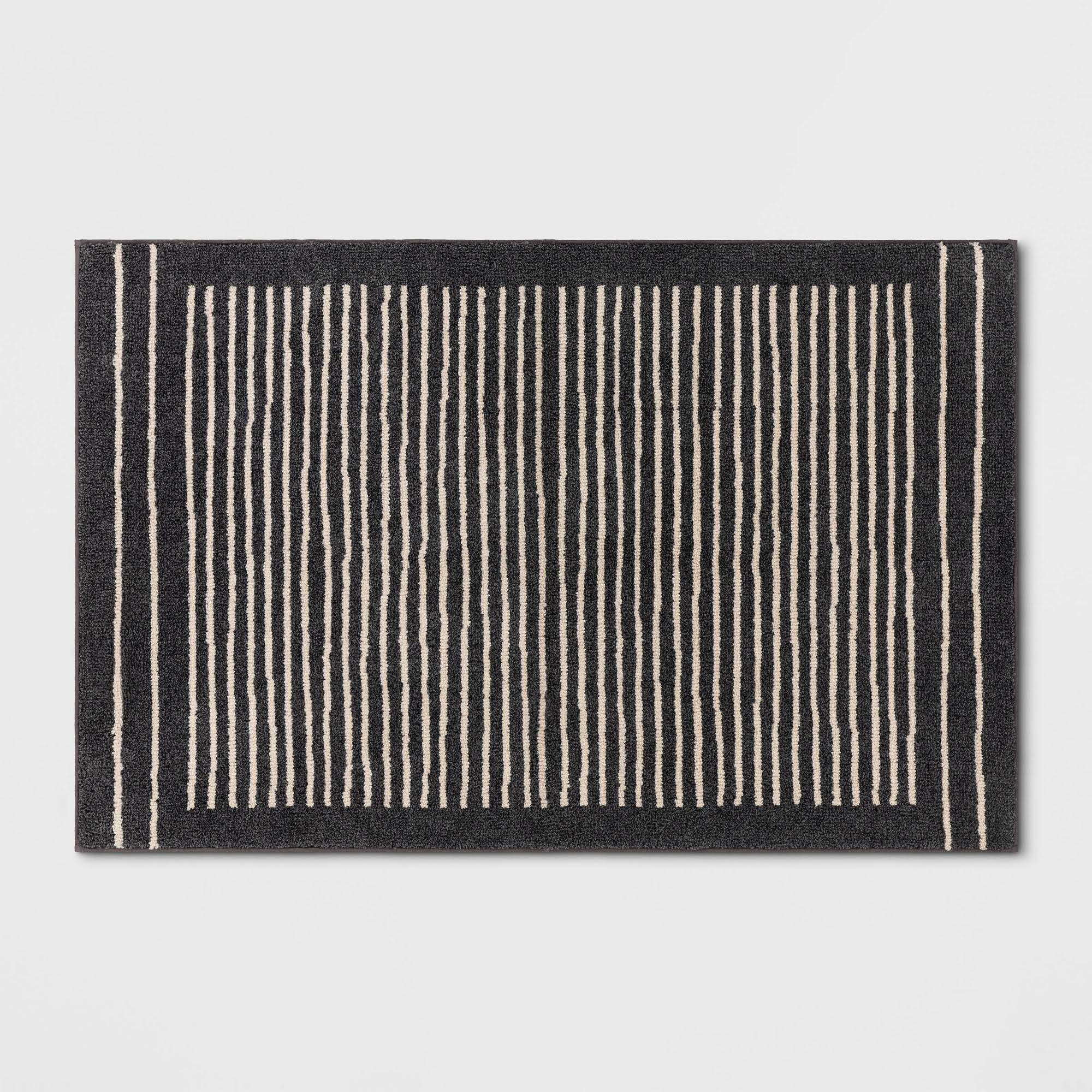 6e47f96f70e63479e3e0386735737a0337b33bb5ddaf47d0e21be20ac2a74328.jpg 2'6"x4' Washable Washable Knitted Stripe Accent Rug Gray - Threshold - Image 1