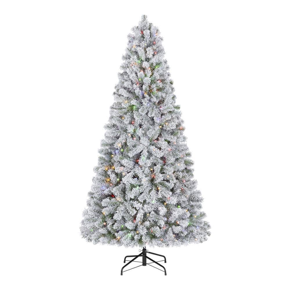 6f67ece044467d696c2af258a9bd49ffa8a56c1d578dcf7f4d5b077b4cdbb880.jpg Home Accents Holiday 6.5 ft. Pre-Lit LED Festive Pine Flocked Artificial Christmas Tree - Image 1