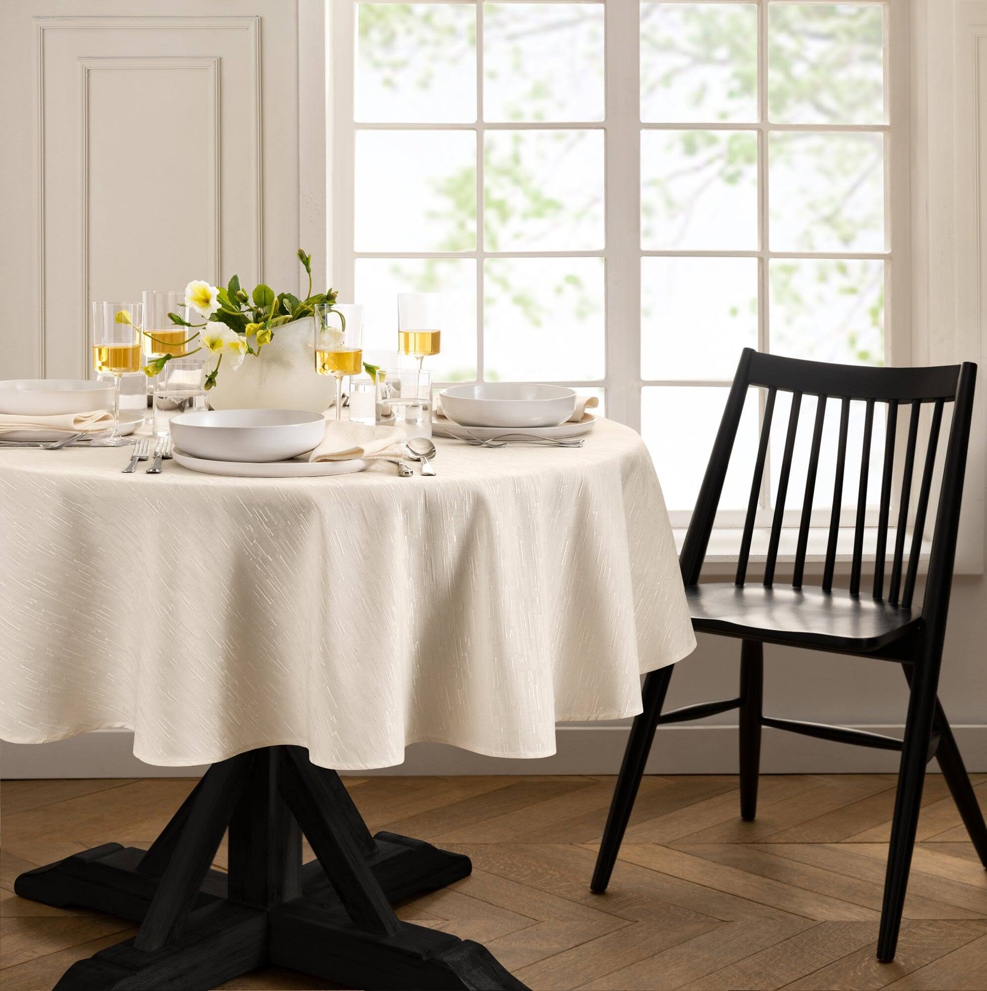 6fad49df915238b4ed1c40afc7a9ae2ff66d797a10a8ce4f677e1699b7ca89bf.jpg Elrene Home Fashions Continental Solid Texture Water and Stain Resistant Tablecloth, 60"x84" Oval, Ivory - Image 1