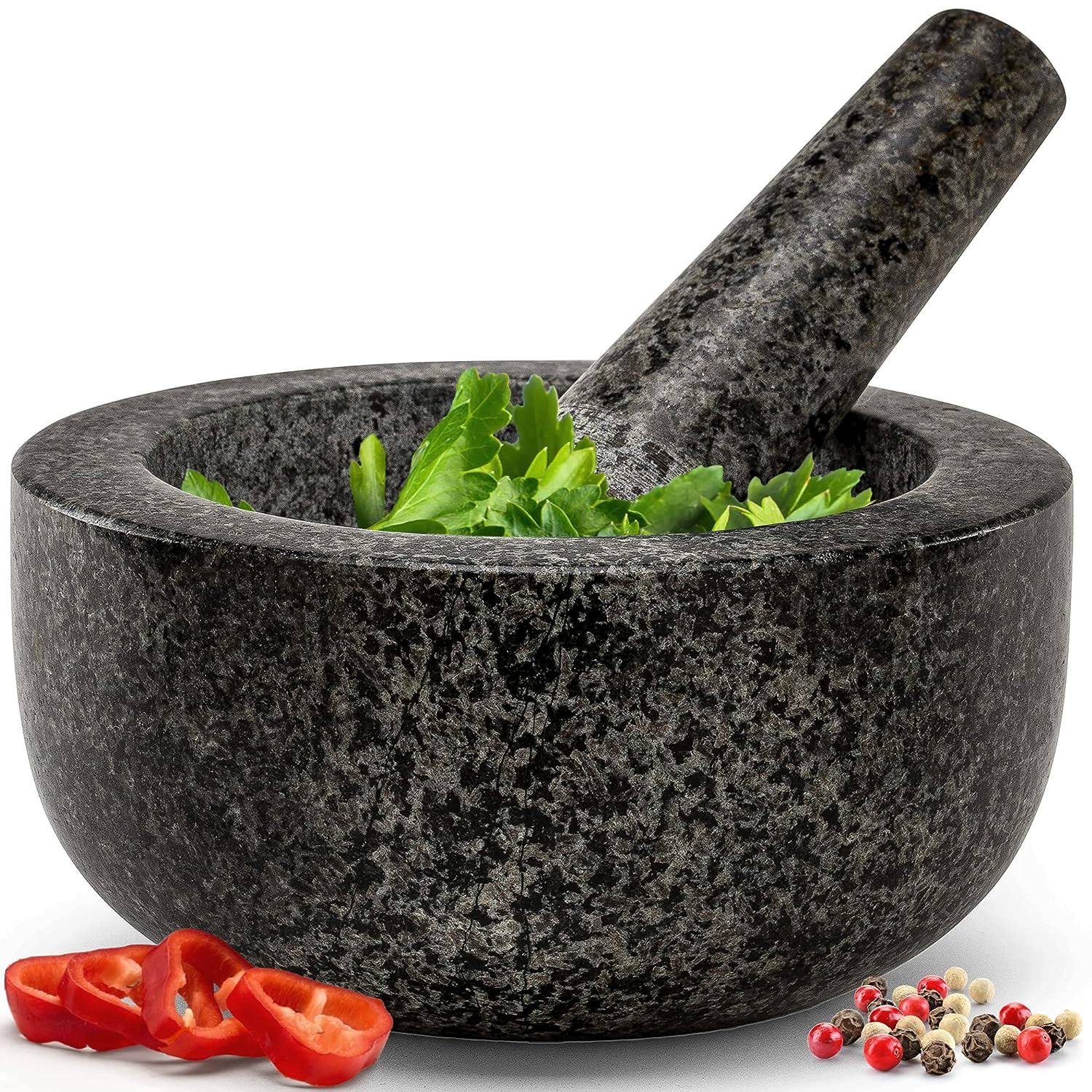 7289bc7c2ca85eff16e26d45ea9f483cb53c41428317ea35c850fff956daa897.jpg Mortar & Pestle Set (Black Granite) for Your Kitchen - Image 1