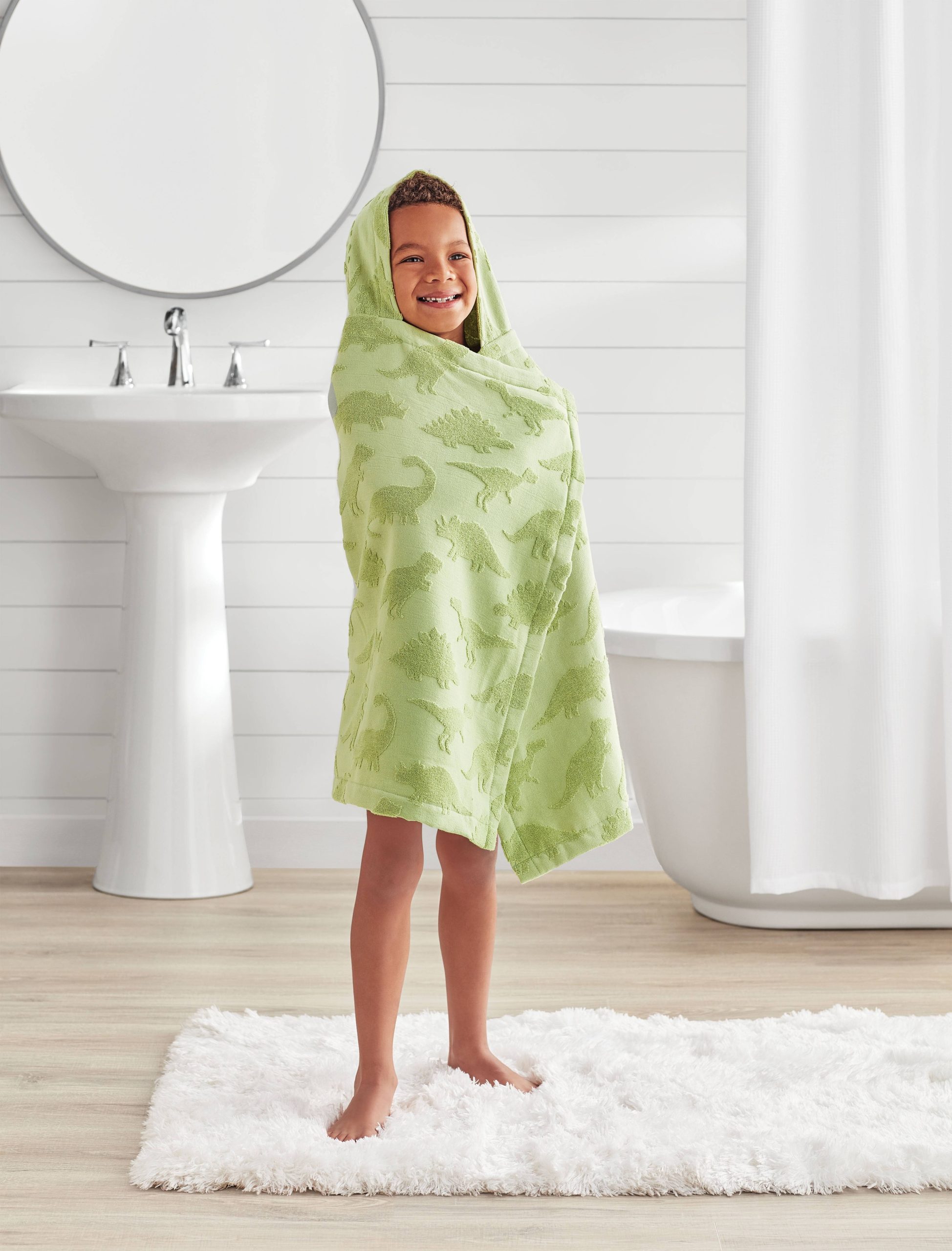 7348957a341bba394592f9b678de05dc8e783ebfc54493b051f89b73f01526ba.jpg Your Zone Kids Green Dinosaur Cotton Hooded Towel - Image 1