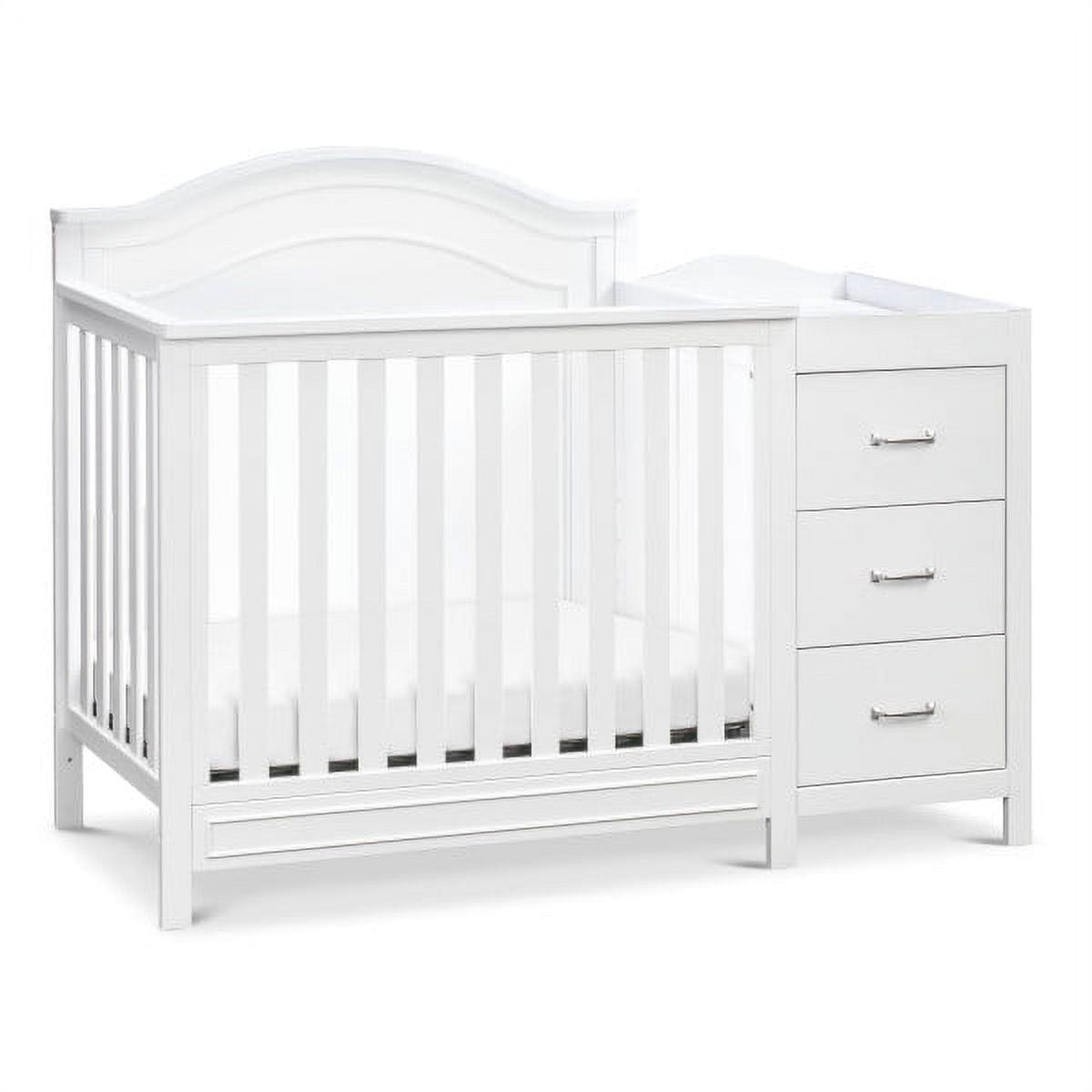 739d3d51771b4c16684e6e23b637683d9dc08608c96a87090814ad5b73eda776.jpg Davinci Charlie 4 - in - 1 Convertible Mini Crib & Changer in White - Image 1