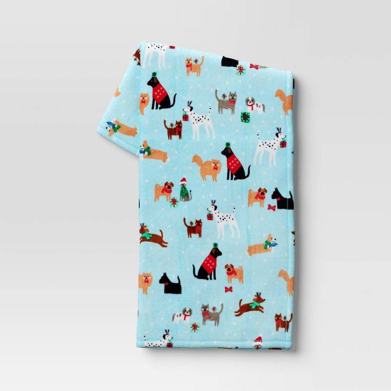 74f4c897315eab1a0859b7819b07a9be198c0ad2d4244ba7e42842c9f217342f.jpg Dog and Cat Holiday Plush Christmas Throw Blanket Blue - Wondershop - Image 1