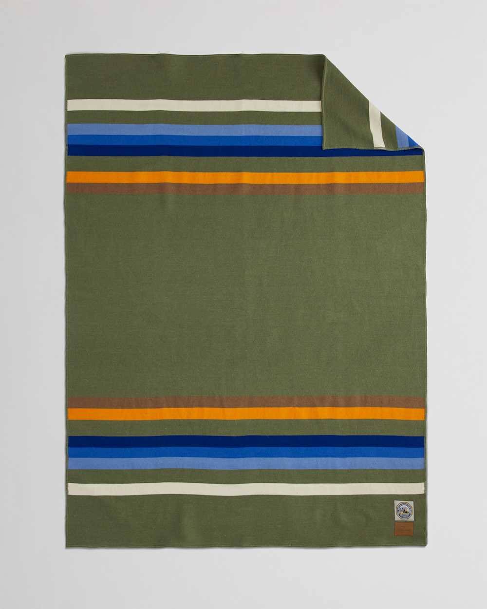755b84c501f4e7f5b96f826bddfa0563bd0859f15ec5708e3a2faae7bc5780e8.jpg Pendleton Rocky Mountain National Park Wool Throw Blanket with Carrier | Unisex | Multi | Wool - Image 1