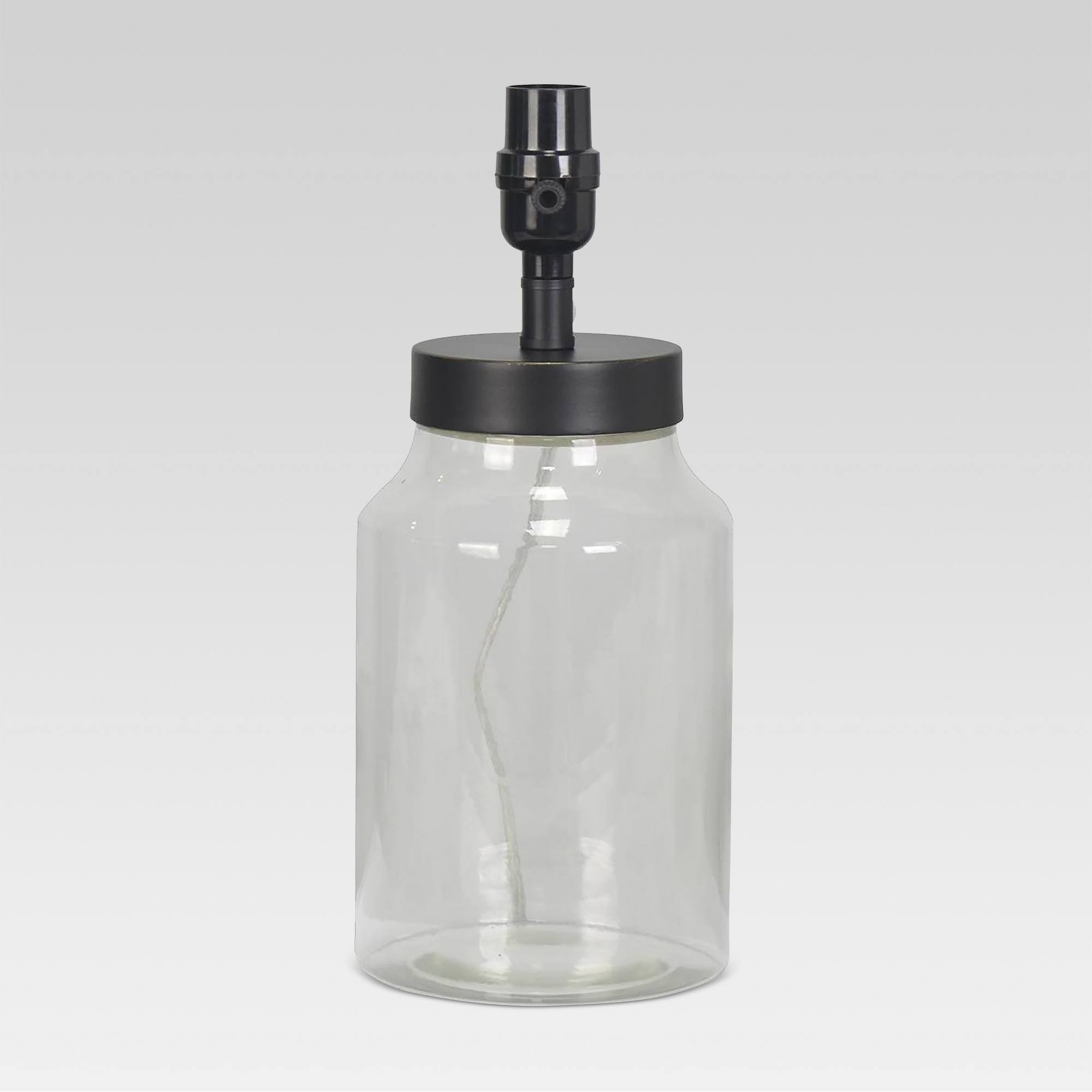 760ecb663aa88c3050e8d302d0459d9f6535e6caf55bbfa7b66e9ead4156723f.jpg Causal Fillable Small Lamp Base Clear Includes Energy Efficient Light Bulb - Threshold - Image 1