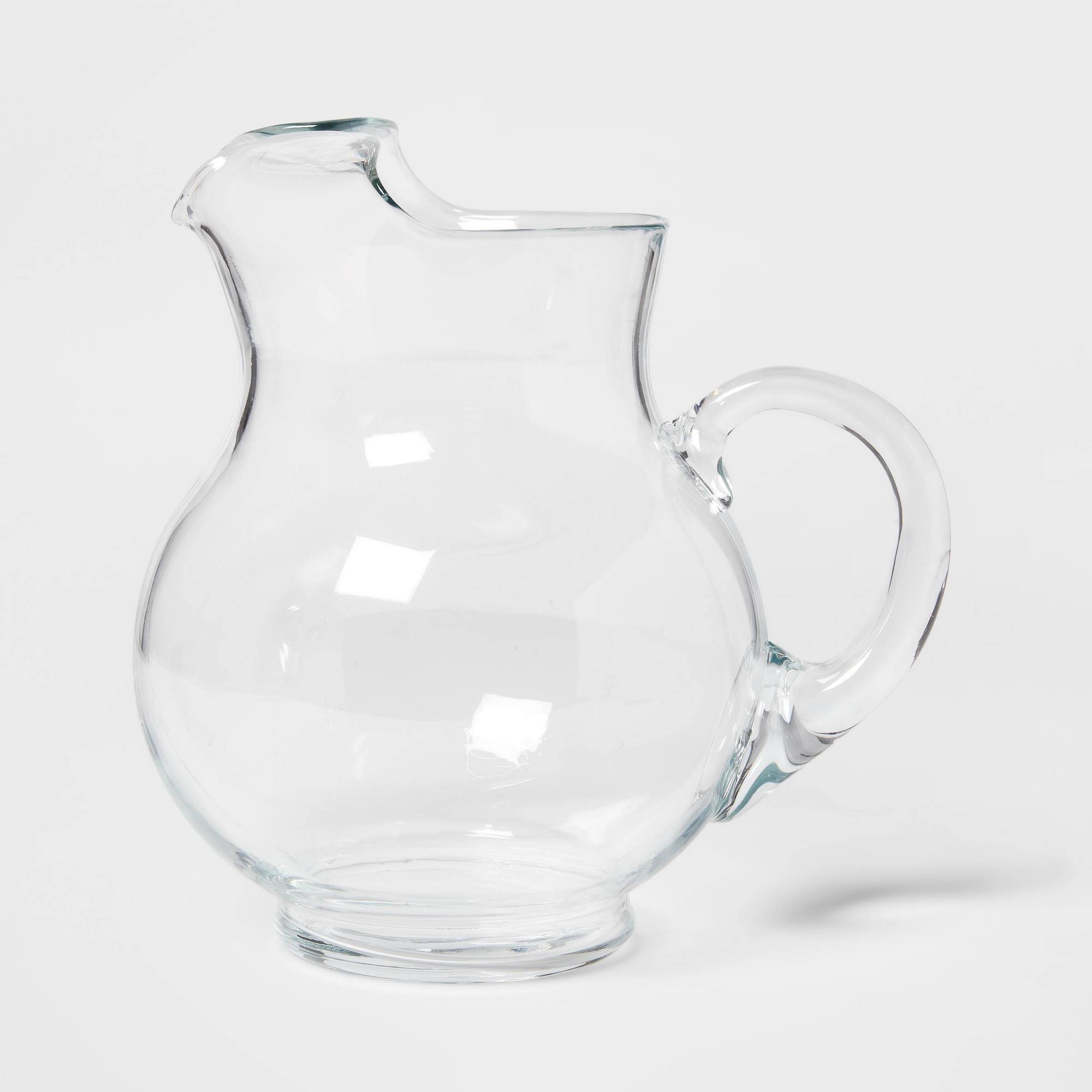 789903f8ddf1fc02e304ab4092bc6d4af66953e1d6aa44a6c833f1434a0d5dcf.jpg 90.6oz Glass Round Pitcher with Handle - Threshold - Image 1