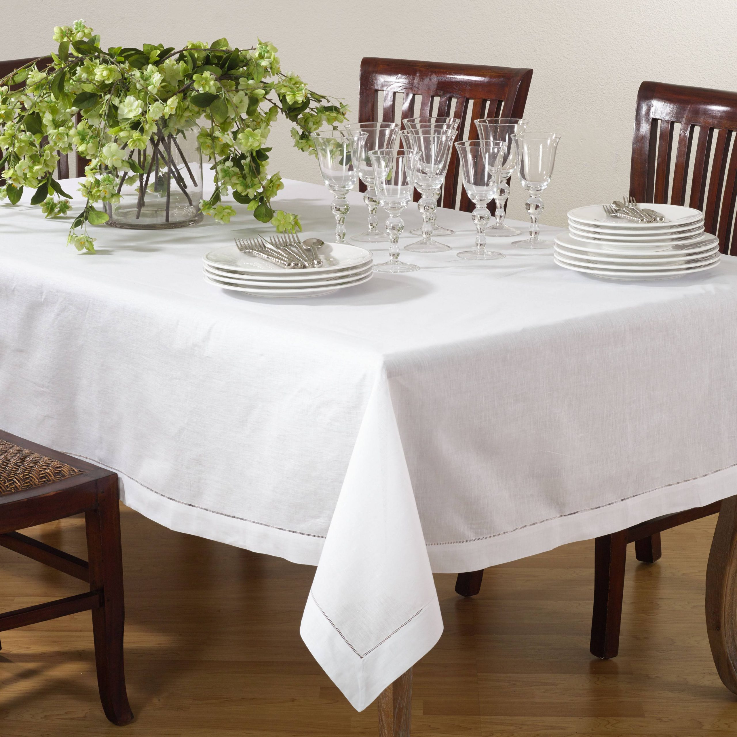 79074f69bf851c1644d740252854bb228d9be1859f44d2c6ddac32ee58ea4304.jpg Saro Lifestyle 65 x 120 in. Hemstitched Tablecloth, White - Image 1