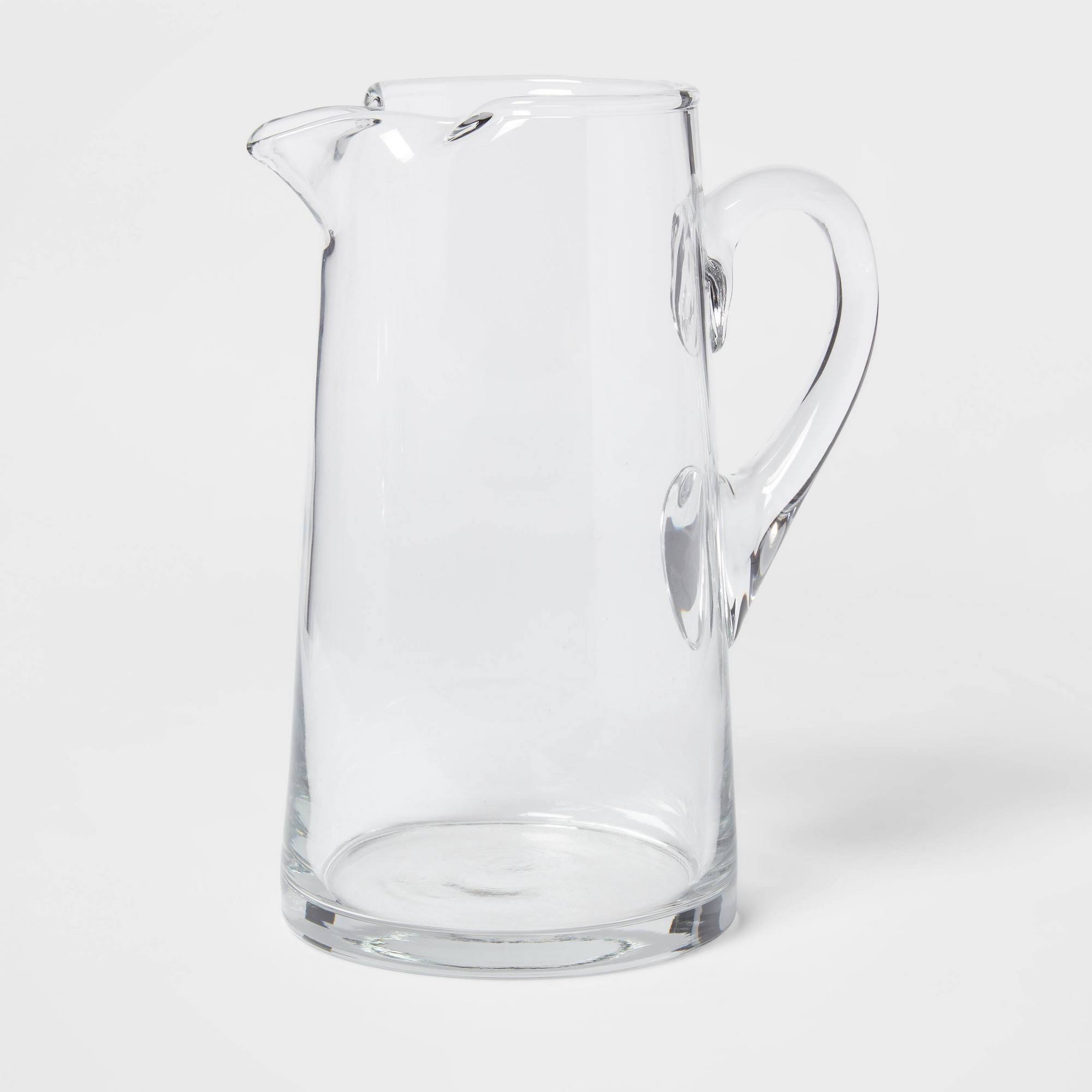 7ab377181f18460feb61b509fd2e4fe2a833c97e971173611cba2a51dbbca961.jpg 90oz Glass Tall Pitcher with Handle - Threshold - Image 1
