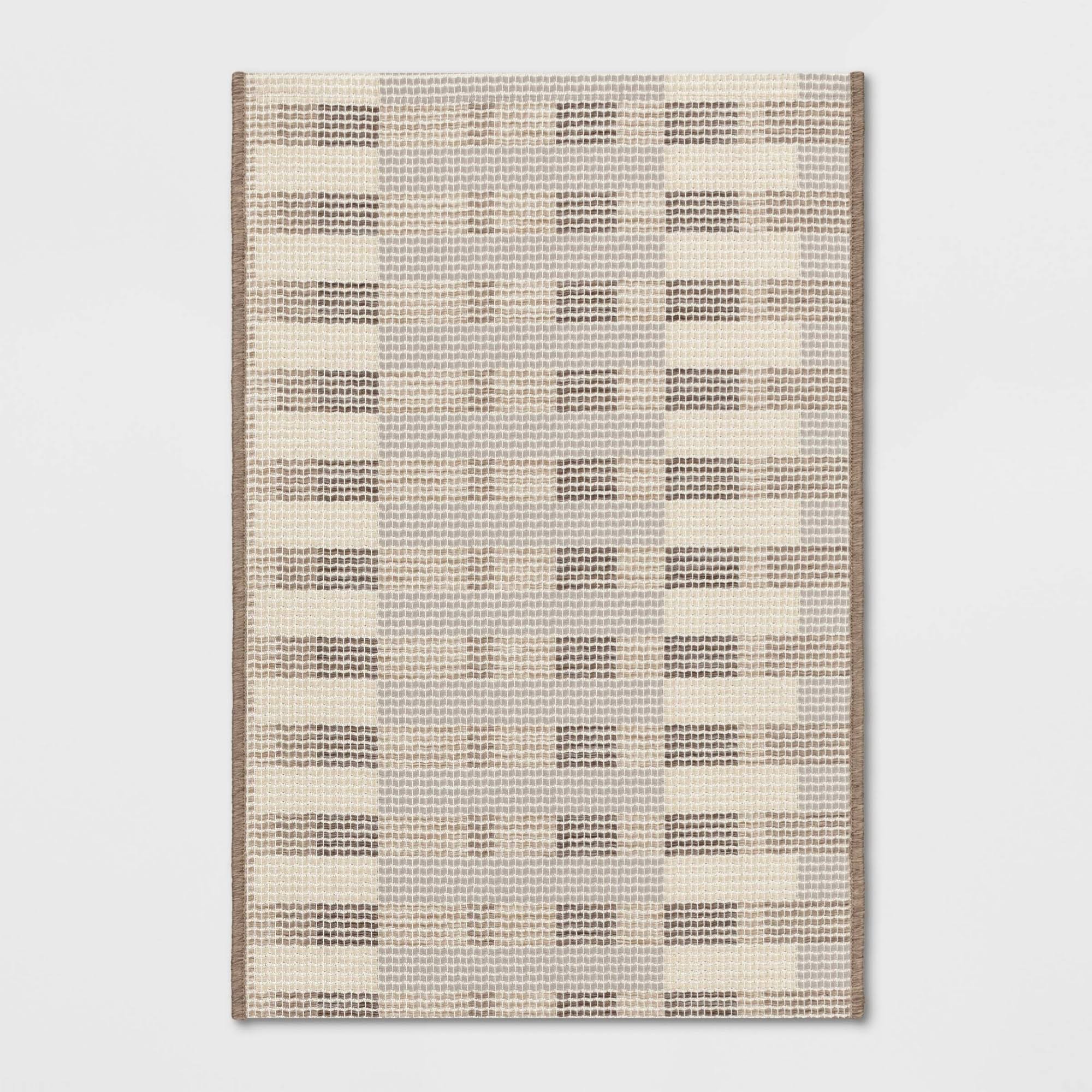 80d8759637ebb600889e51e4ce8621591eb8f608dd92ec3e90acd4c8461e7373.jpg 30"x50" Beachside Grid Outdoor Rug Naturals ÿ Threshold Designed with Studio McGee - Image 1
