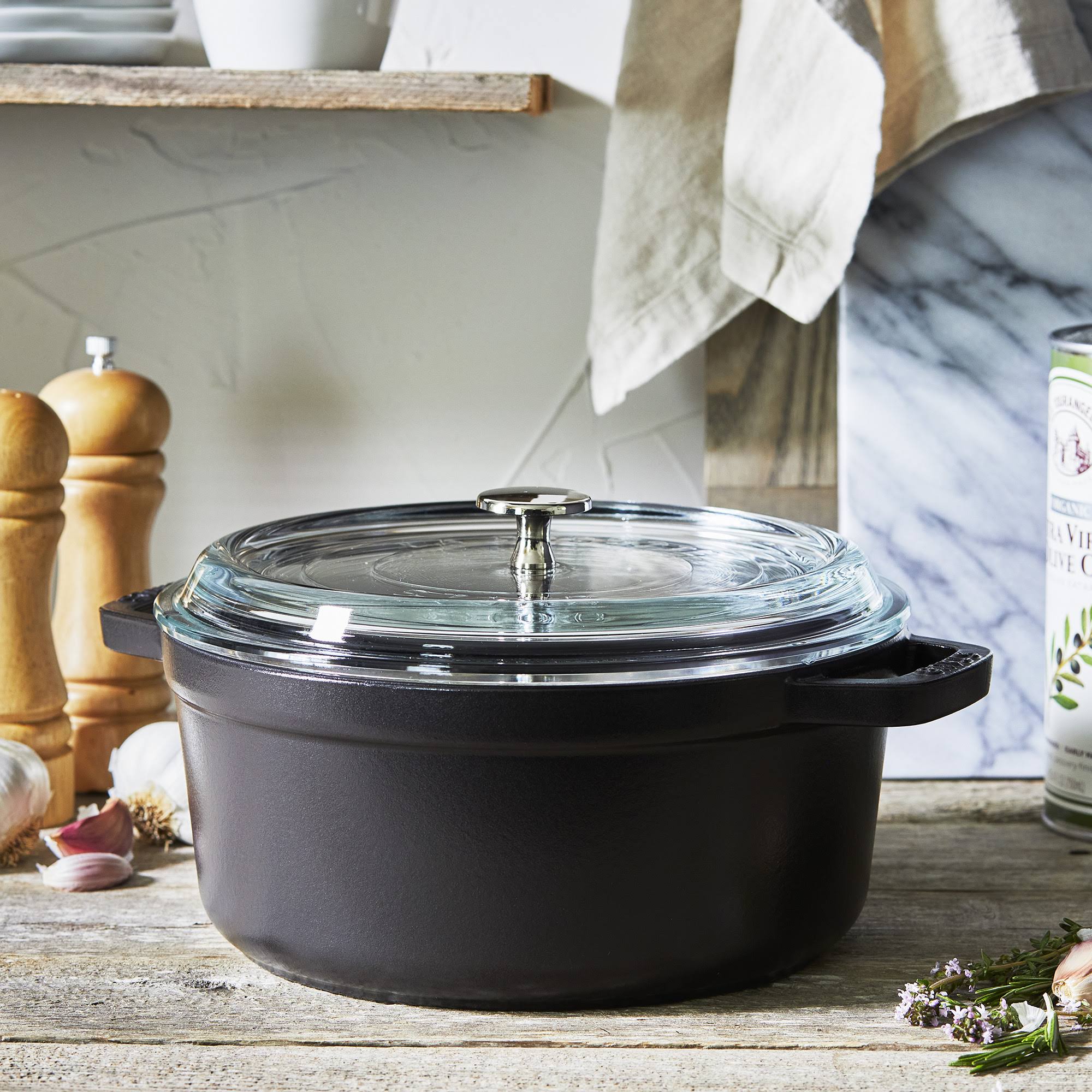 82c776f446af479b611d675c360af68ec5e2cb31868197a5a5b176488dc31913.jpg Staub 4-Quart Cast Iron Round Cocotte with Glass Lid - Black - Image 1