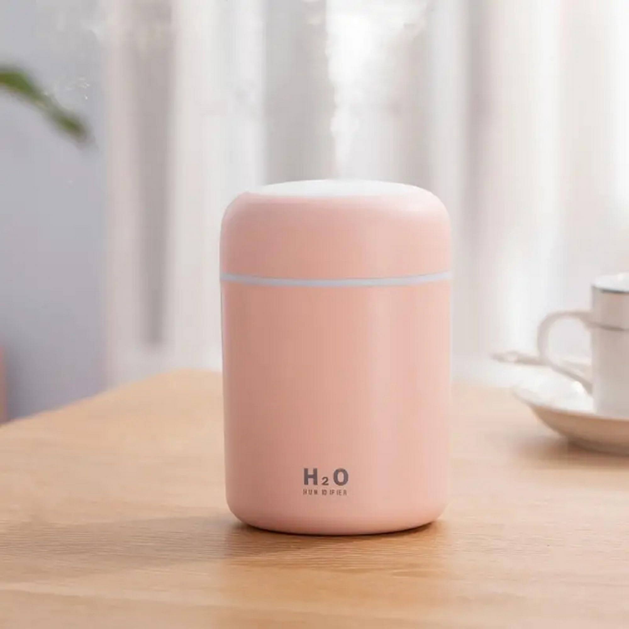 857be0d7cfeff5137c37eb2ab050262d867ef93026f1caead8251dd315ec1947.jpg Portable Mini Humidifier, Colorful, Cool Mist, USB Powered. Perfect for Bedroom, Office & Car (300ml, Pink) - Image 1