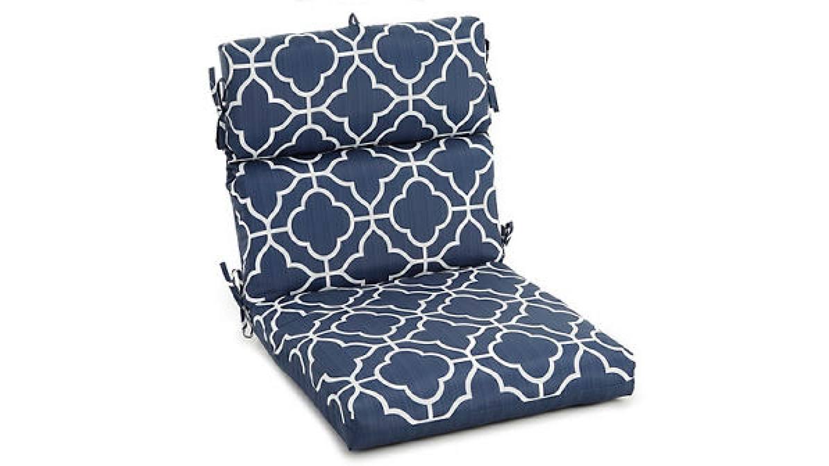 8d28bfd5d880ecbc59030863f62984b9f9412ac6d92de1dad446d3adf6cae2c5.jpg Fandango Navy Blue Quatrefoil Reversible Outdoor Chair Cushion - Image 1