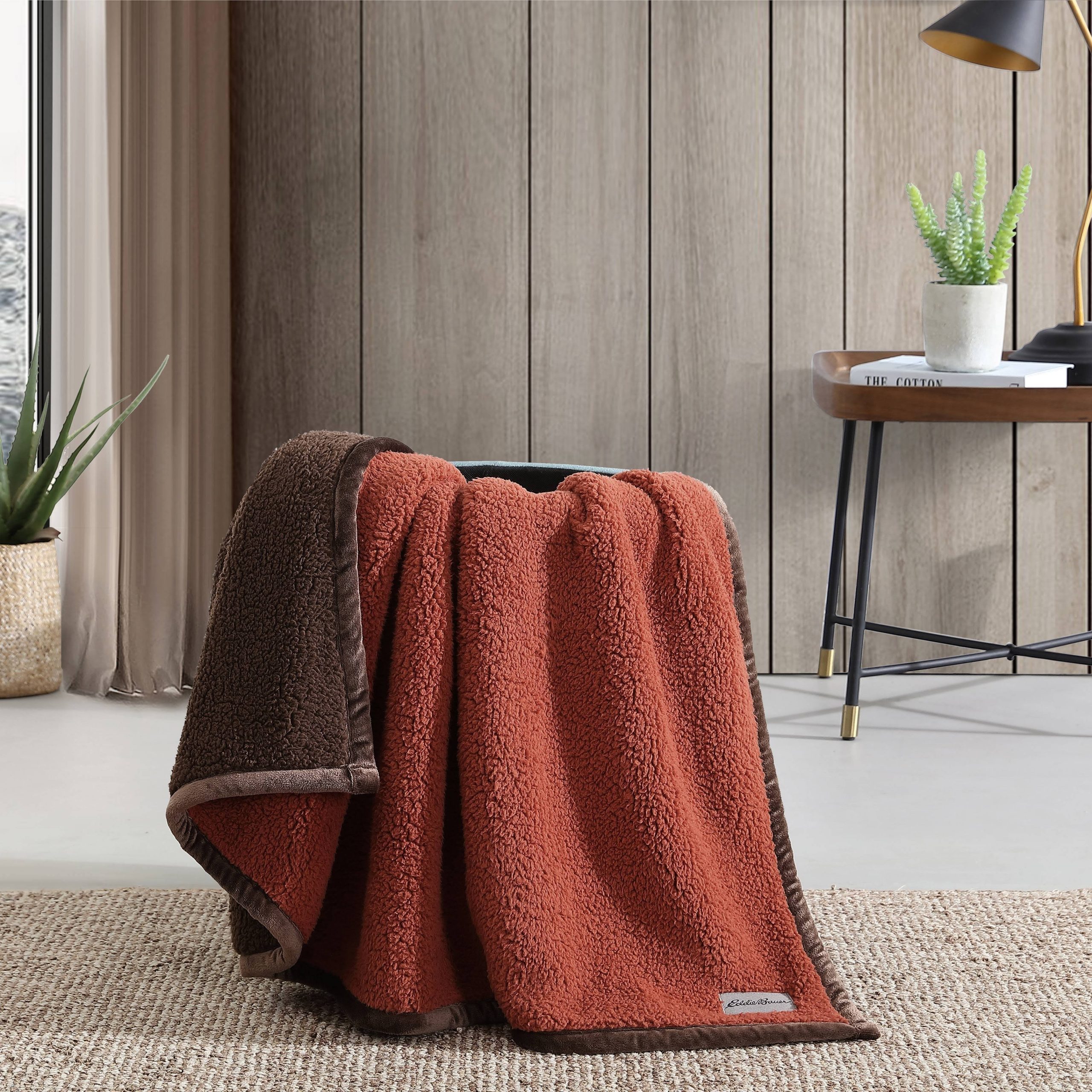 8dbb77ce31707db516306ea79f740d1ec7e5f59e4bd58a2276497b3b3638e289.jpg Eddie Bauer Bi Colored Sherpa Reversible Throw Blanket - Orange/Brown - Image 1