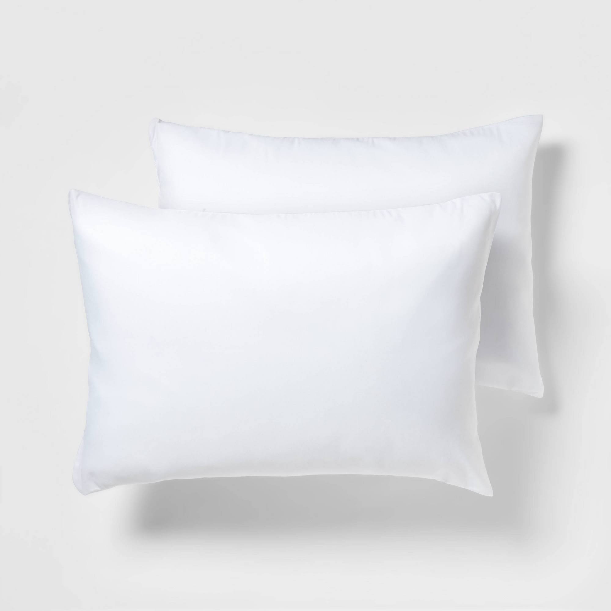 924dbdfb2de2f9abac398ddd8a62913fdaa917ad592934ae63ae4018bacac745.jpg Room Essentials 2 Pack Pillow Protector - White (Standard) - Image 1