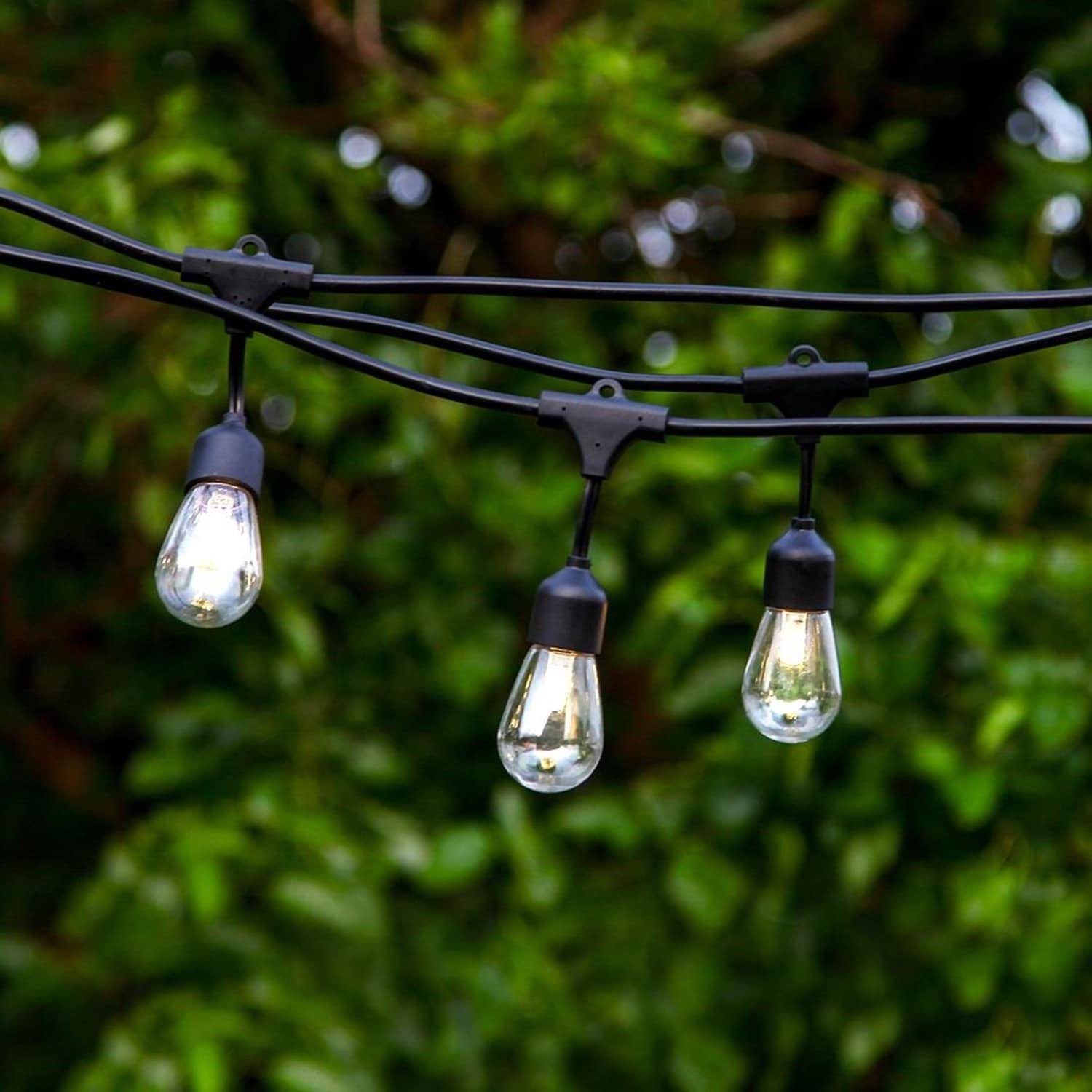 9319266af74db3b04856811ada87d390820971af8682fca0c2ce4da4d5baa6fb.jpg Brightech Ambience Pro Solar 27 ft Edison Bulb Outdoor String Lights Hanging 2W LED Patio - Image 1