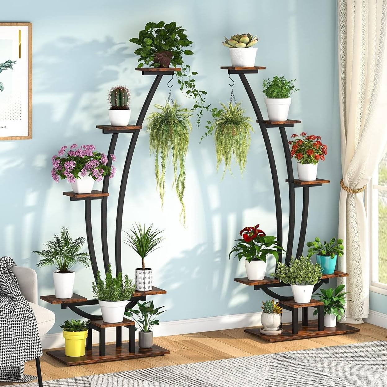 93263c4bc3e29f5ec5aa6371cf327bcc99d0149fcf60505527084572dcbf41c0.jpg Tribesigns 6 Tier Metal Plant Stand Pack of 2, Multi-Purpose Curved Plant Display Shelf with 2 Hanging Hooks - Rustic Brown & Black - Image 1