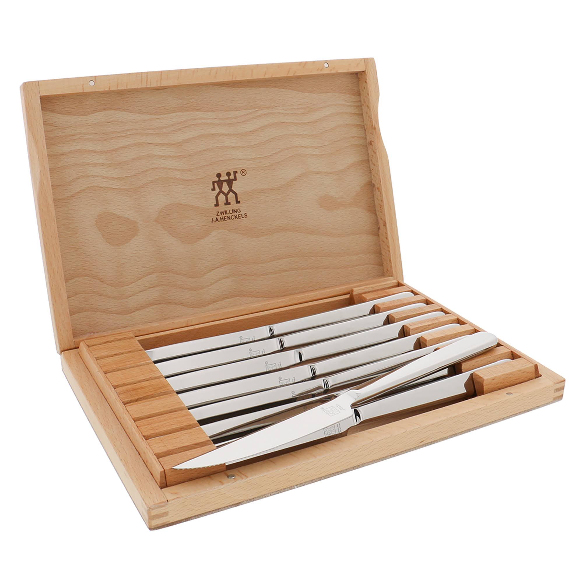 94d02a464cfb868dc7f45eb3627e7552d1414273923fa74abf0a3df4a84d254f.jpg Zwilling J.A. Henckels 8-Piece Stainless Steel Knife Set with Presentation Case - Image 1