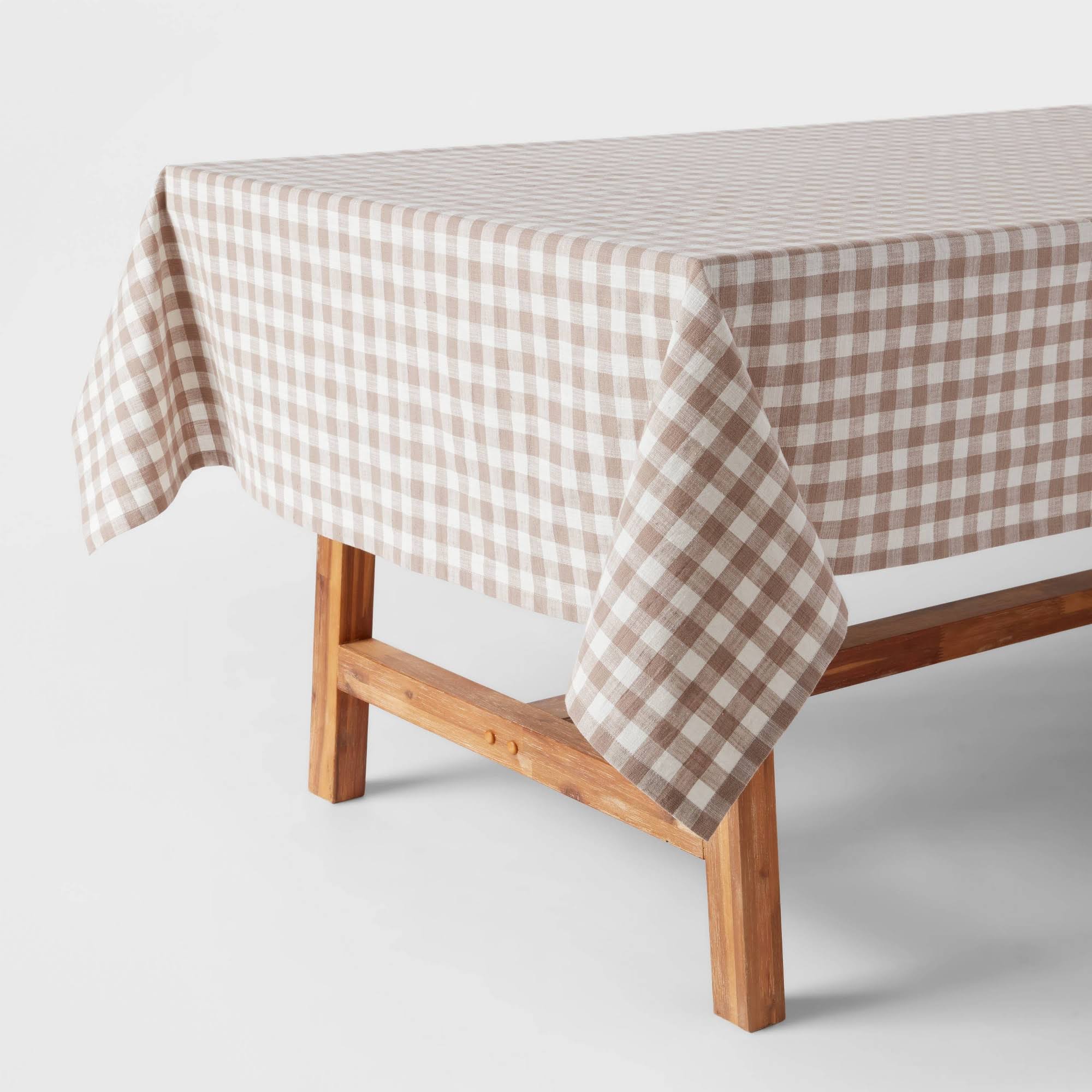 9556e5ba185d7aac0c213f98cd4c3eb418a51b976486db3157294db20083350a.jpg 60" x 84" Cotton Gingham Tablecloth Taupe - Threshold - Image 1
