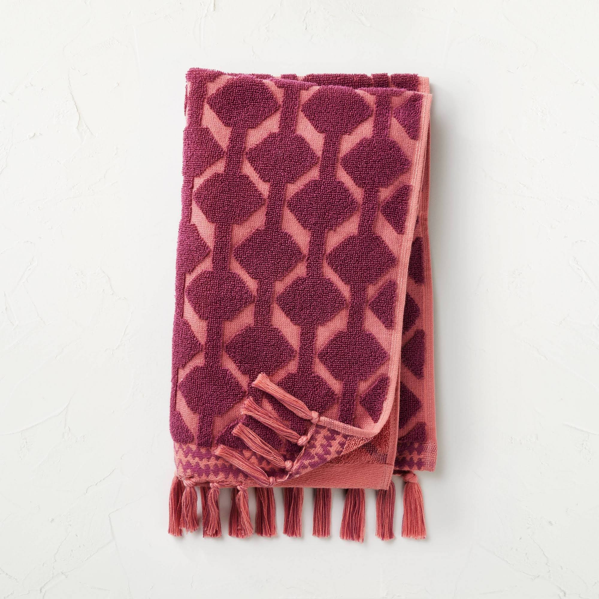960e08eedb2ef3616e65da7c017735224240aac722de4272470e09bb04bc4f7f.jpg Seasons Go Around Hand Towel Red - Opalhouse Designed with Jungalow - Image 1