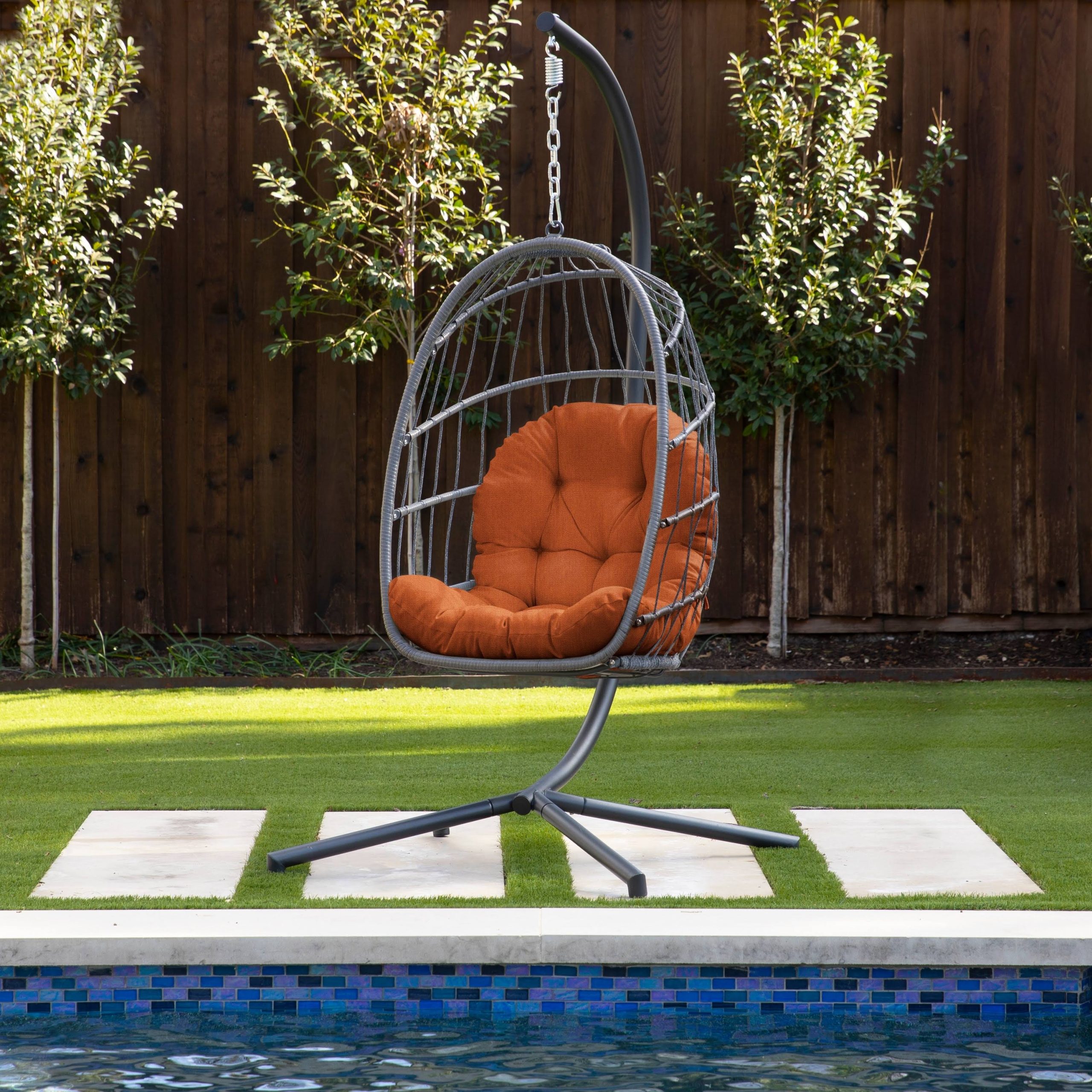 981438c4f10c0e0c9f4d64a5a67bfbf9a7342761956ebb5922c04b09e0267a03.jpg Humble + Haute Sunbrella Egg Chair Cushion (Cushion Only) - 27 x 44 x 4 Inches - Canvas Rust - Image 1