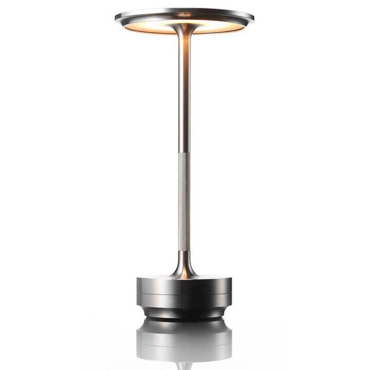 983fbacb0c5663eb68b8d15d702d23333ea322bb11629fa8cb04b016f011f28d.jpg Ambient - Metallic Cordless Table Lamp - Rechargeable - Waterproof - Silver - Image 1