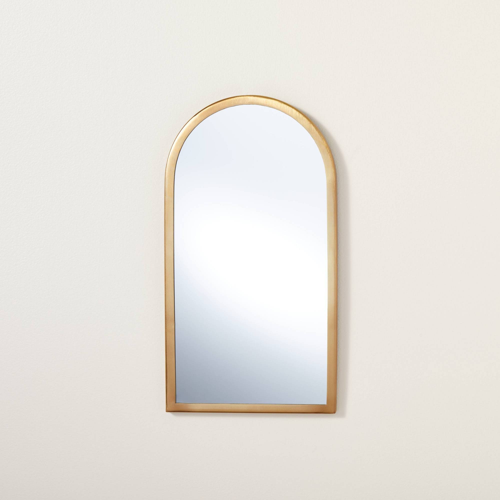 9a6b50a645d1986ec827265a6b1fbe6511c7b67e86b4e175ac2a31babc4f67a0.jpg Arched 8" x 16" Metal Frame Wall Mirror Brass Finish - Hearth & Hand with Magnolia - Image 1