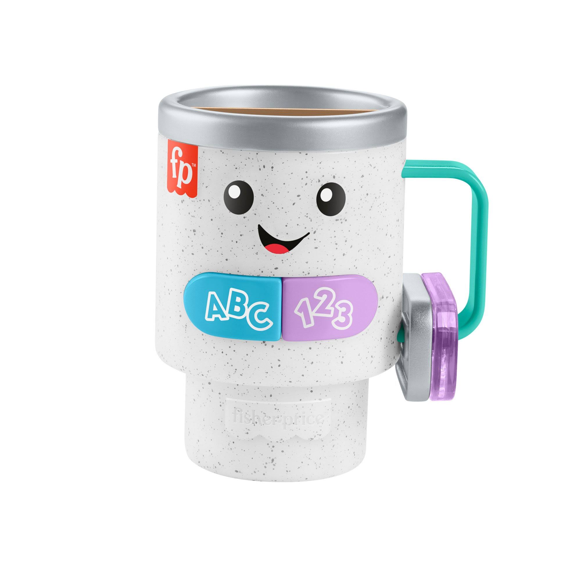 9c83c1ca5edb288aea8a4ddee7d7462daa2707e944c2a217e74e7cc36f1f2f47.jpg Fisher-Price Laugh & Learn Wake Up & Learn Coffee Mug - Image 1