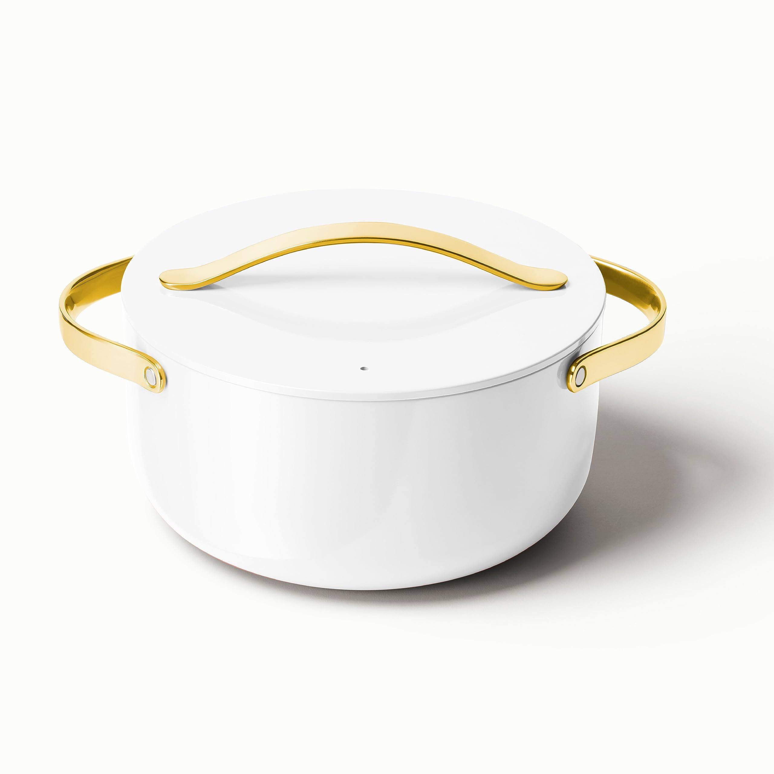 9d636716d43bcd50901c3f0d1aa88dc130983b462736e2e453f6d2f75ca6d7f8.jpg Caraway Dutch Oven in White with Gold Handles - Image 1