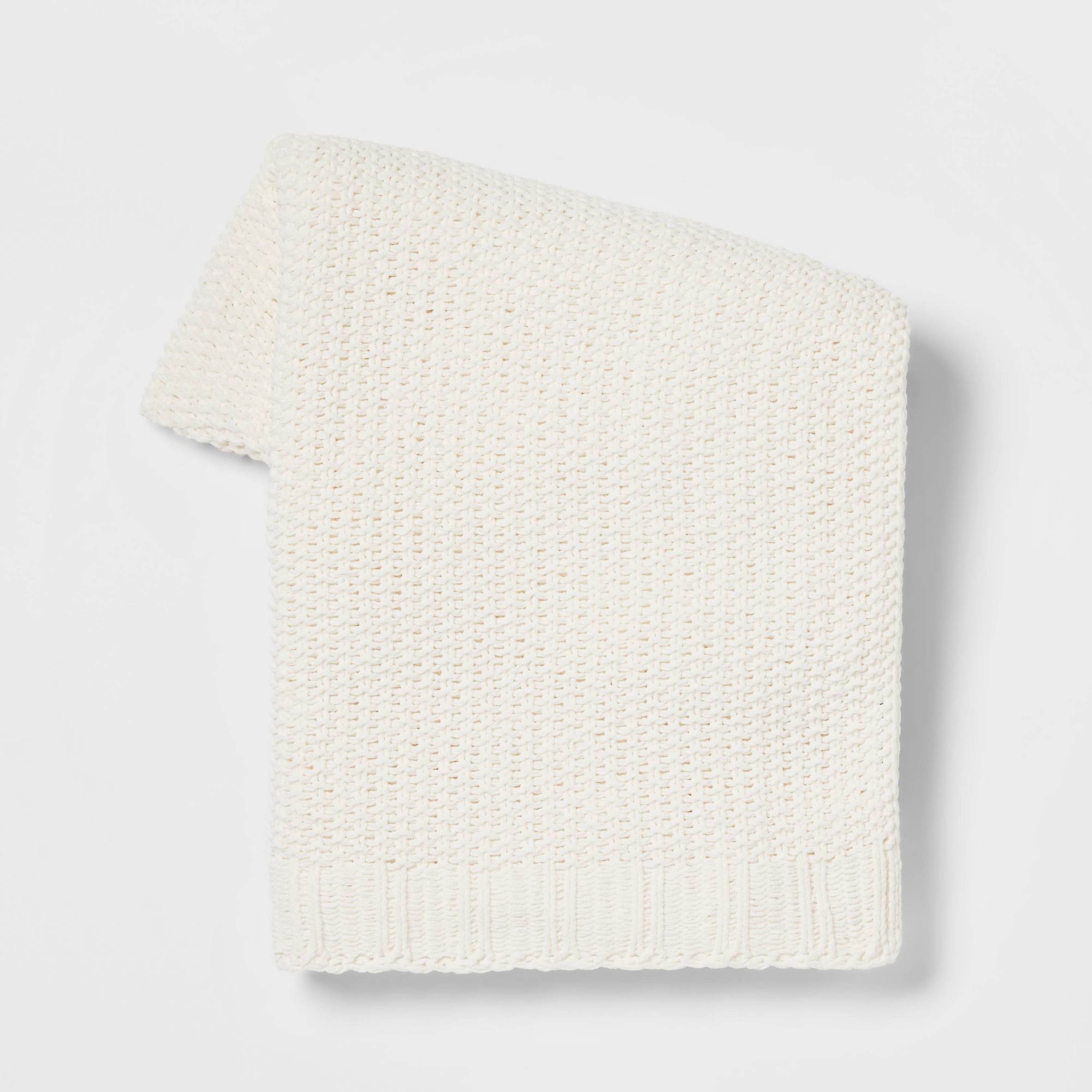 a0310387437c6dd602e4349738e781ced5df002b5896a3d0f45c4fbf46867025.jpg Threshold Solid Chenille Knit Cream Throw Blanket | Target - Image 1