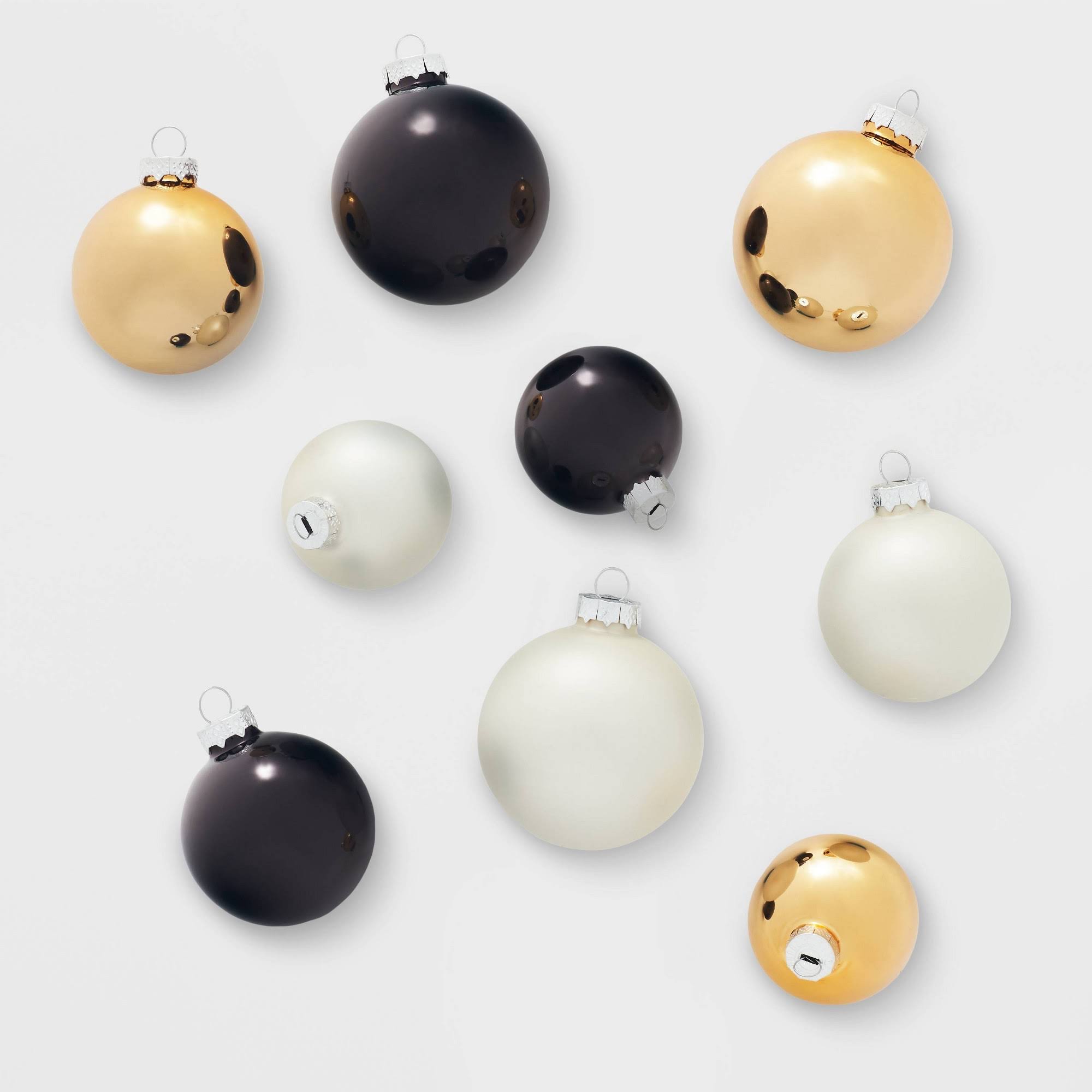 a04dc54317cc63d64aa9d9b71ff33d4ddfecbf4d121e7e9e86209c3e19c8ae01.jpg 42ct Round Glass Christmas Tree Ornament Set Black/White/Gold - Wondershop - Image 1