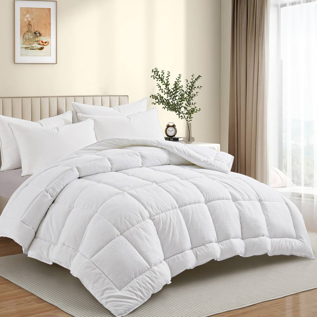 a2f757a1acf2366c763b7501f0e0e3b933292fa07399cf7aa1cc9f7fa5e2d6ff.jpg Wayfair Sleep All Season Down Alternative Comforter Size: Twin - Image 1