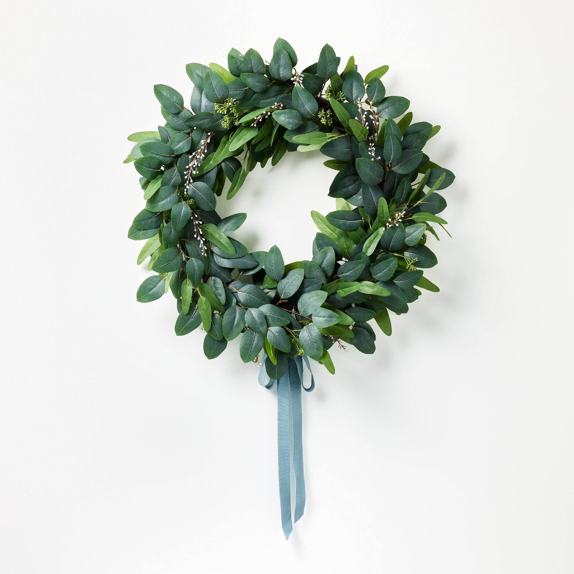 a40d15a87a459cfdc01893a3accc9007cea3359e189ea97115183cc008762c2d.jpg 26" Eucalyptus Wreath with Ribbon Green - Threshold Designed with Studio McGee - Image 1