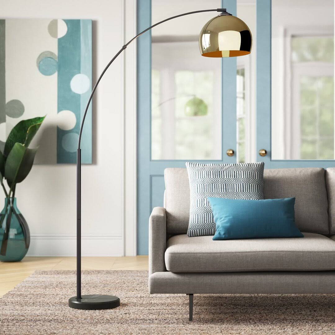 a7411008007835e27c60daeb217fcf6a7fd8580319ce9155b1093172d7c7f58f.jpg Sevag 67" Arched Floor Lamp Orren Ellis Shade Color: Shiny Brass - Image 1