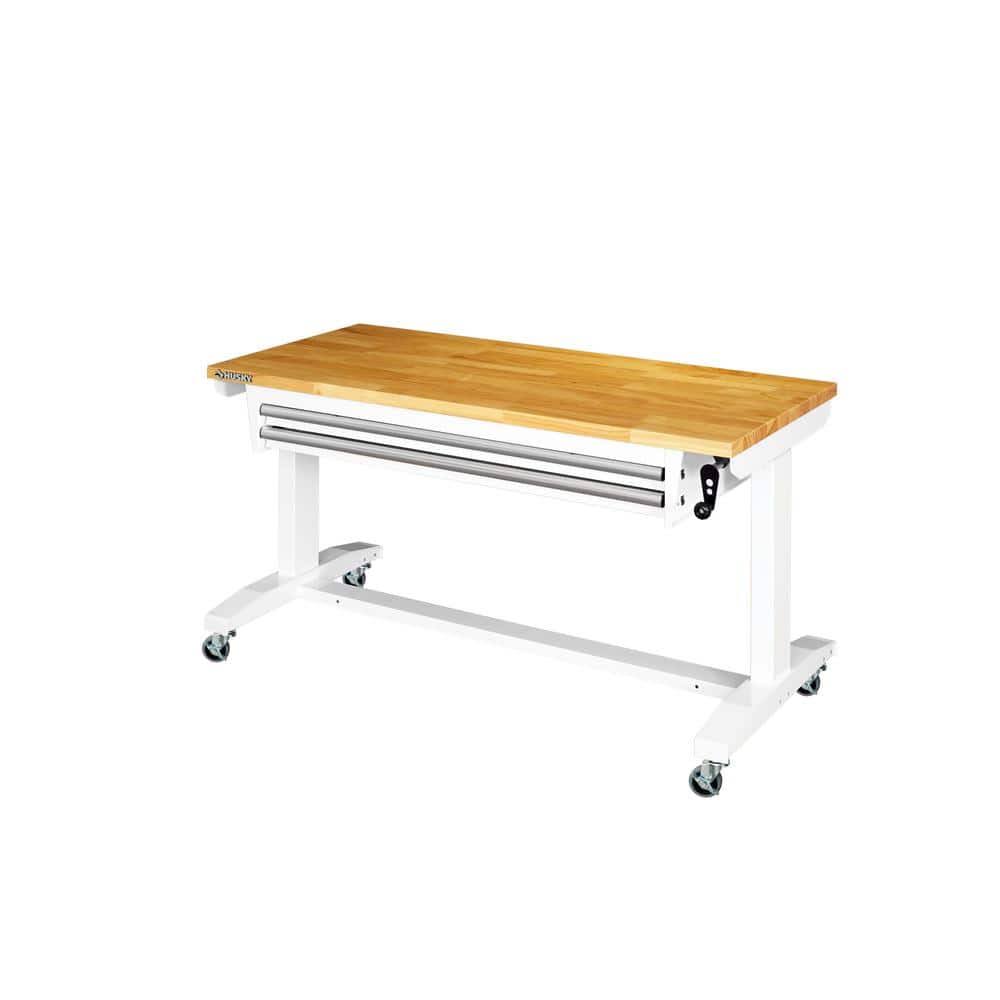 a76b0d83f7be6d6dde206c38102f3596dd7cdf0e8a62973e59633d2d6e7bb2de.jpg Husky 52 in. Adjustable Height Work Table with 2-Drawers in White(White) - Image 1