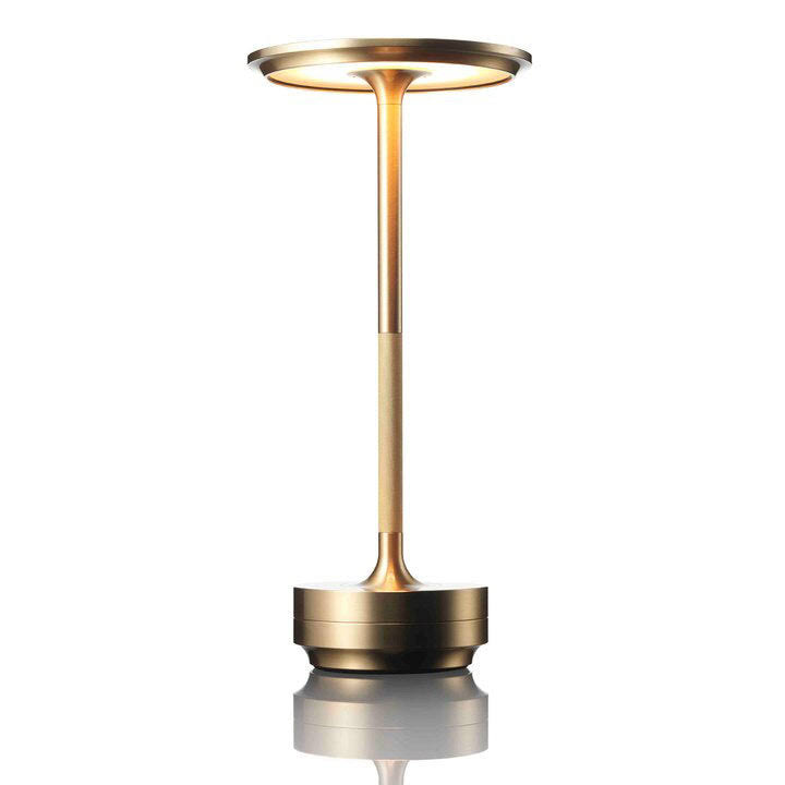 a8563cd9fa9f2ecc473d2934508e6e8fe816f358f1928d82ea704054075508c7.jpg Ambient Metallic Cordless Table Lamp - Rechargeable & Waterproof Gold - Image 1