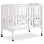 Dream on Me 2 - in - 1 Folding Portable Mini Crib in White. Mattress Pad Included. Easy to Fold and Store Baby Crib. Two Adjustable Mattress Height Positions Convertible Crib
