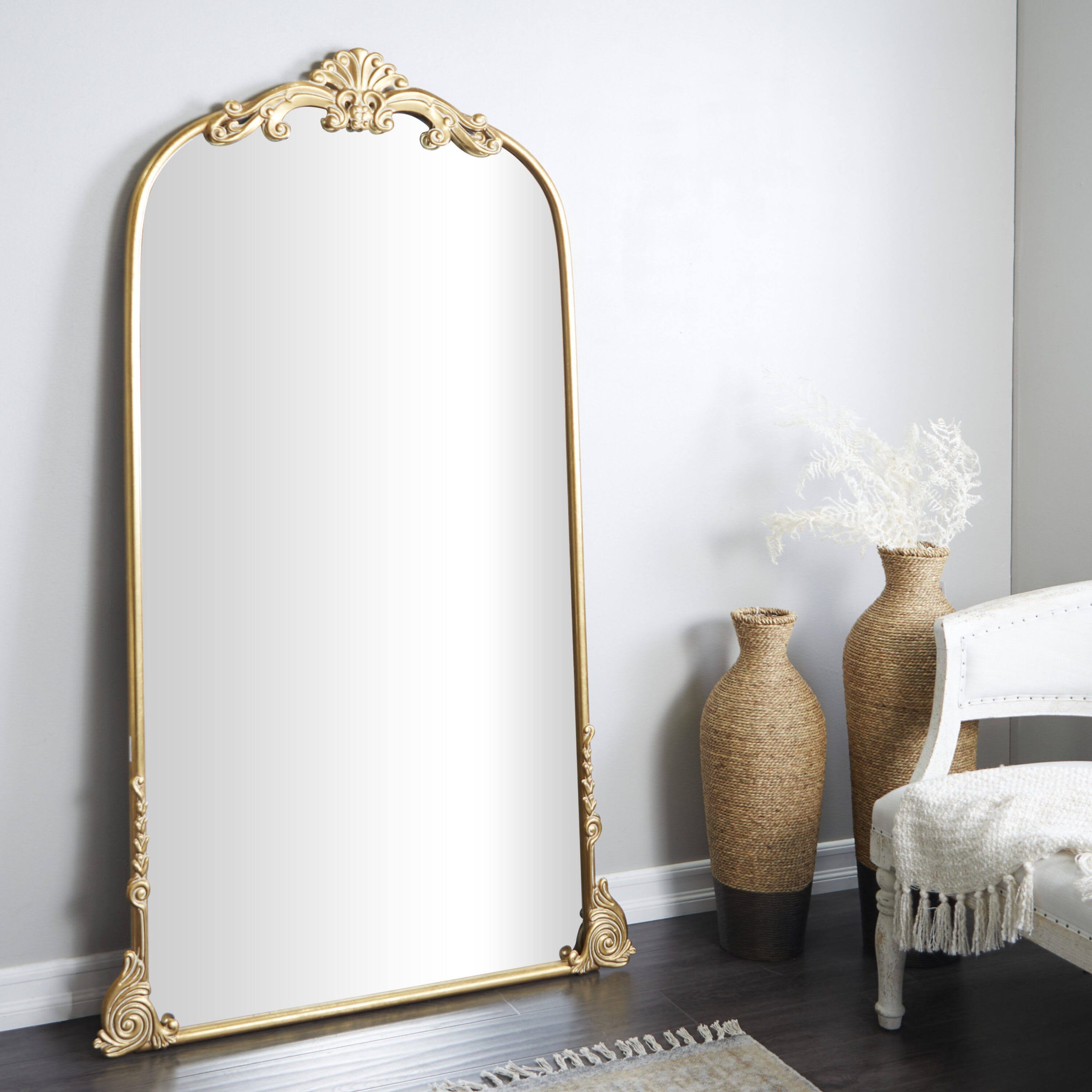 ad7f498e4e2ff4a4d270d4906e2a02a55aa9004b118dd27e7d2ec47e9f84fac8.jpg Antique Farmhouse Vintage Inspired Floral Arched Wall Mirror | Metal - Image 1